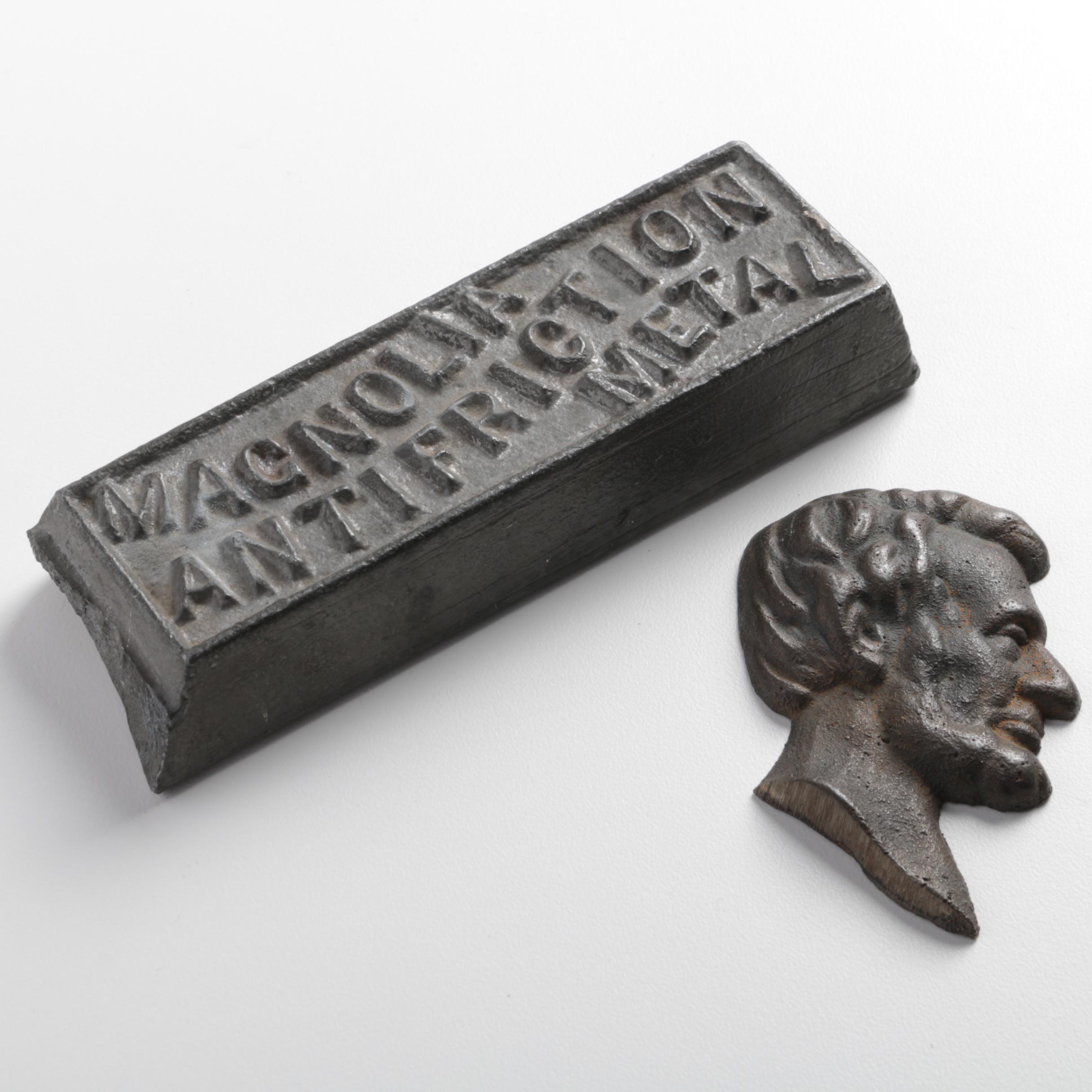 Magnolia Anti-Friction Metal Ingot and Cast Iron Lincoln Silhouette