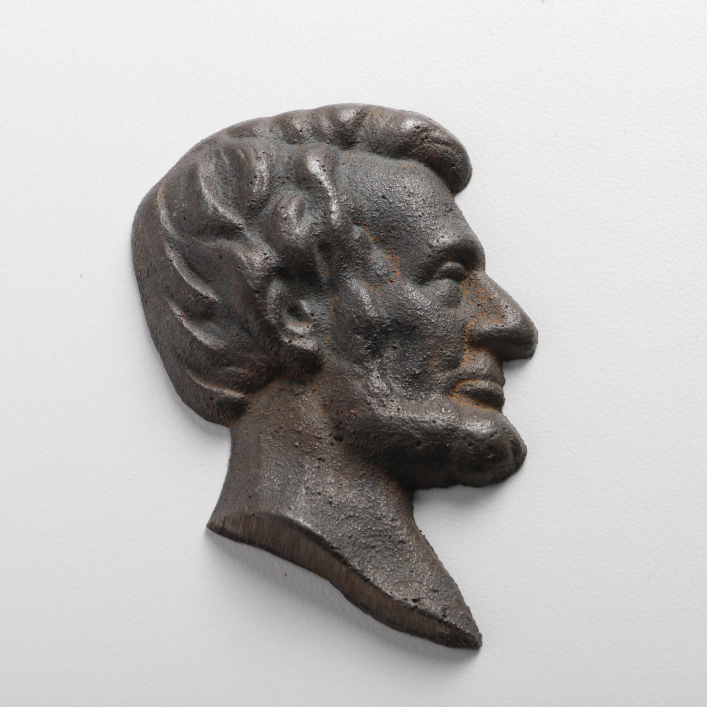 Magnolia Anti-Friction Metal Ingot and Cast Iron Lincoln Silhouette