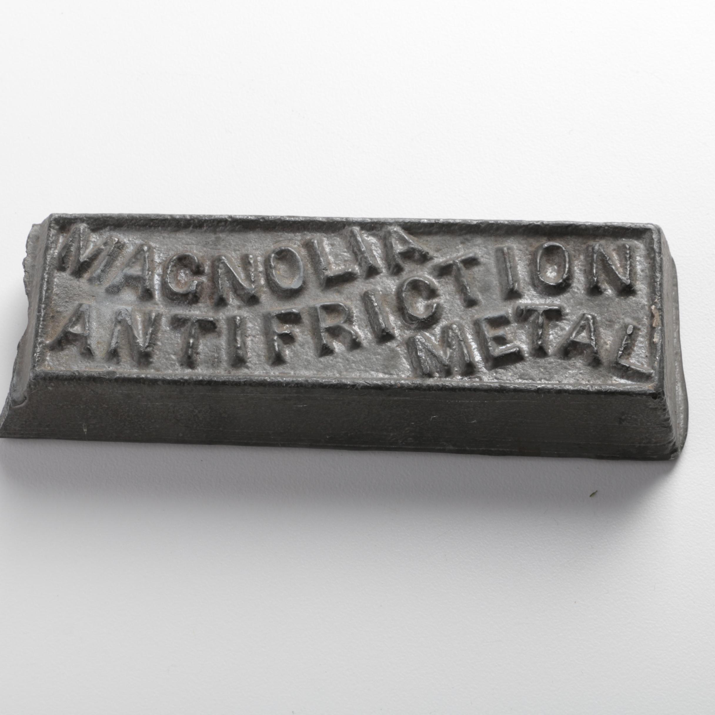 Magnolia Anti-Friction Metal Ingot and Cast Iron Lincoln Silhouette