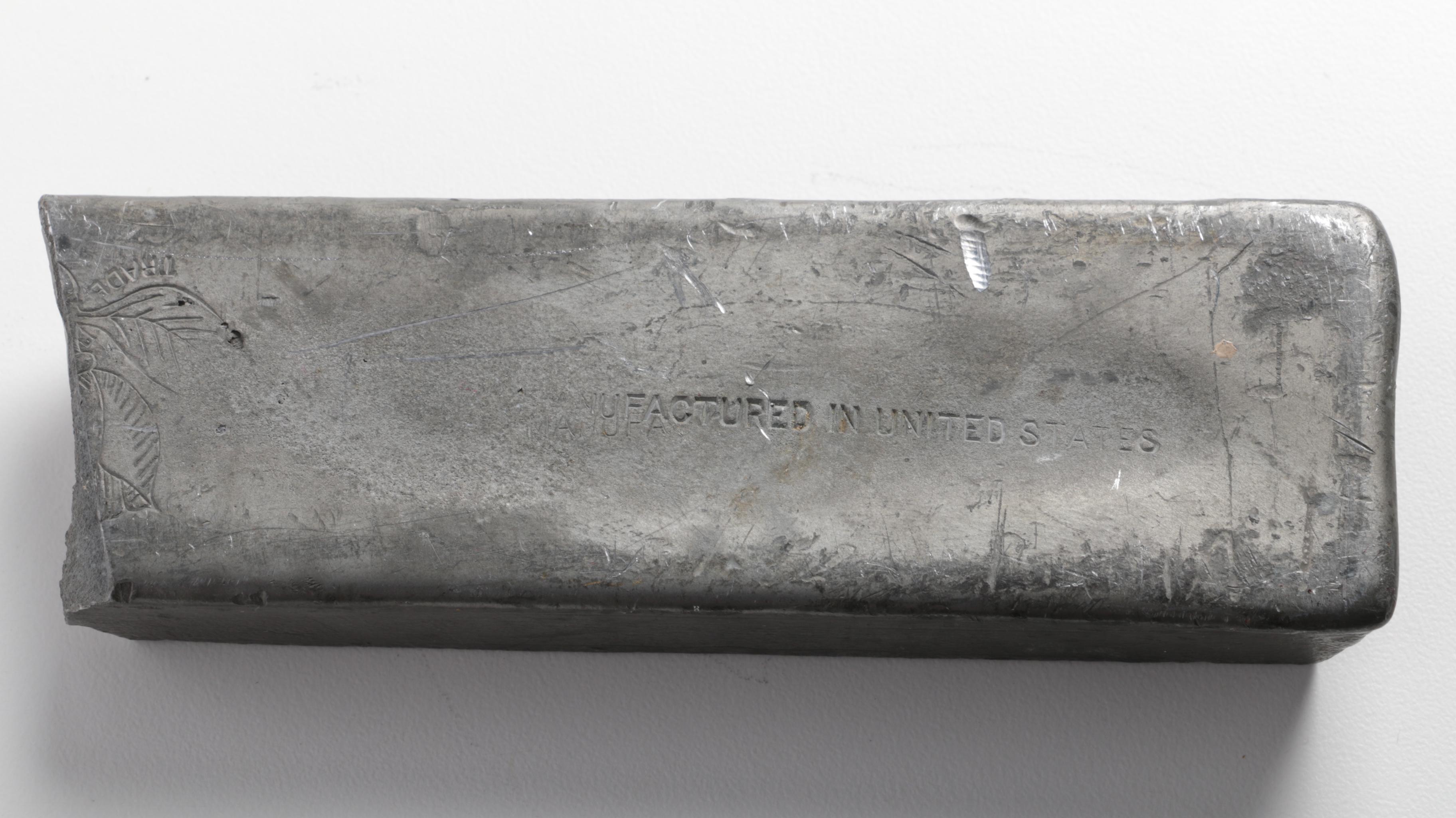 Magnolia Anti-Friction Metal Ingot and Cast Iron Lincoln Silhouette