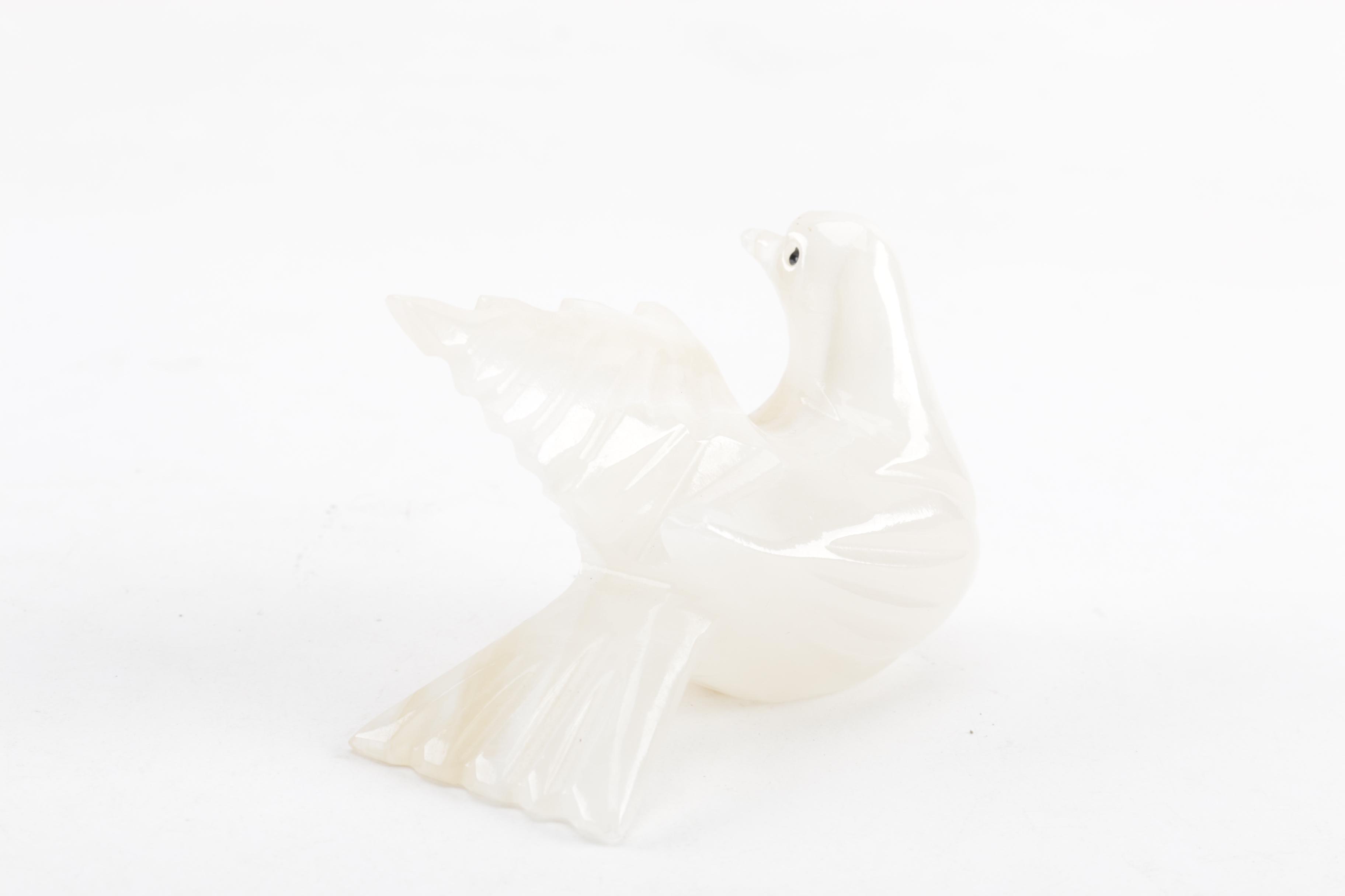 Ornate Stone Bird Figurines