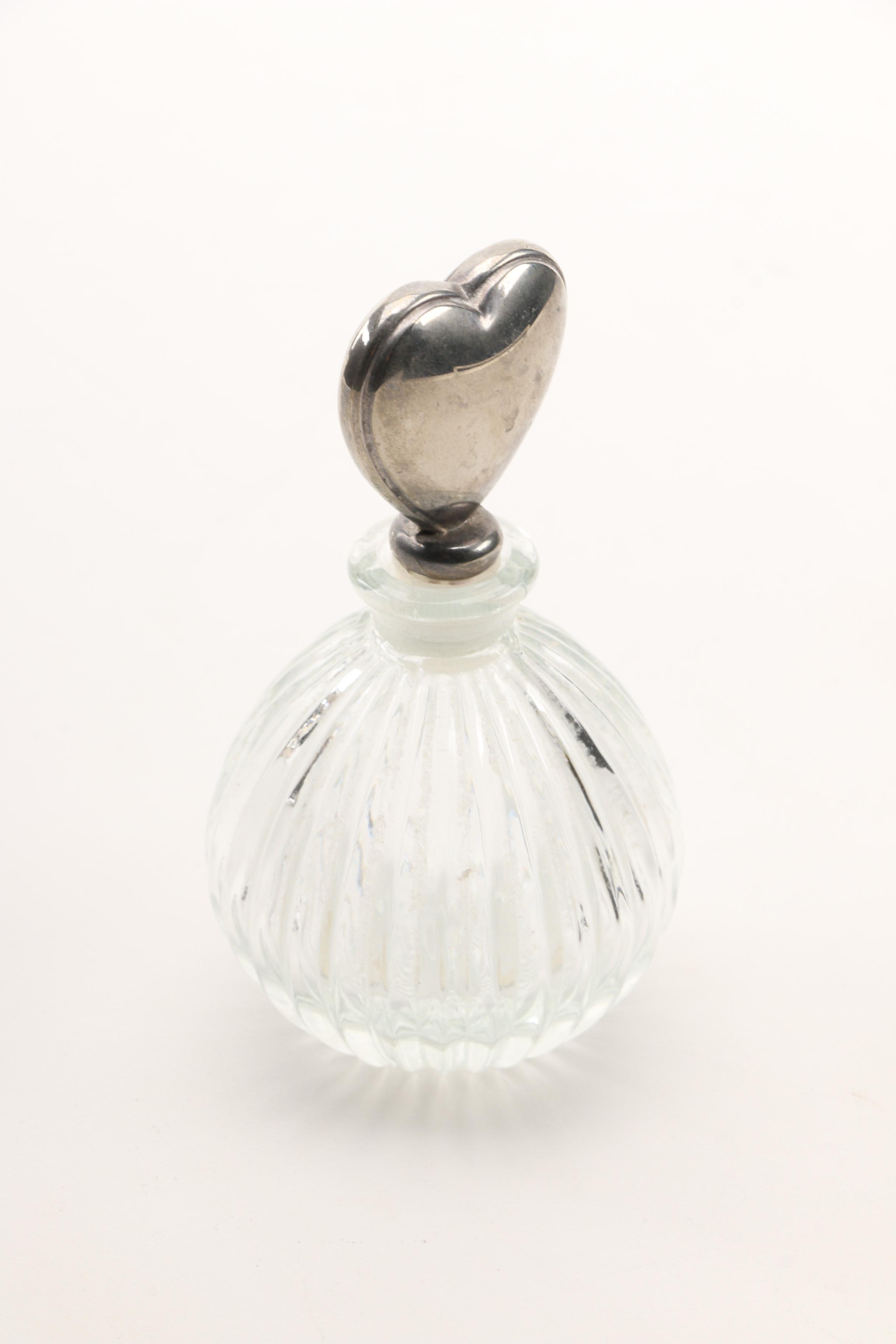 Christian Dior Perfume Bottle and Other Bottles Featuring Sterling