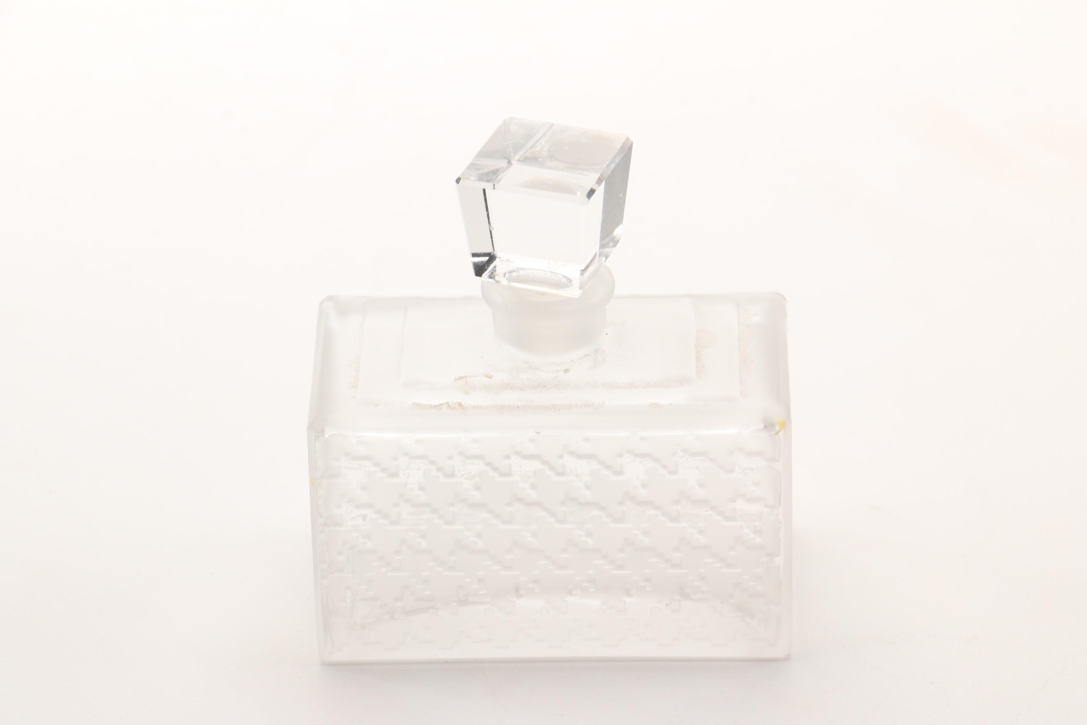 Christian Dior Perfume Bottle and Other Bottles Featuring Sterling