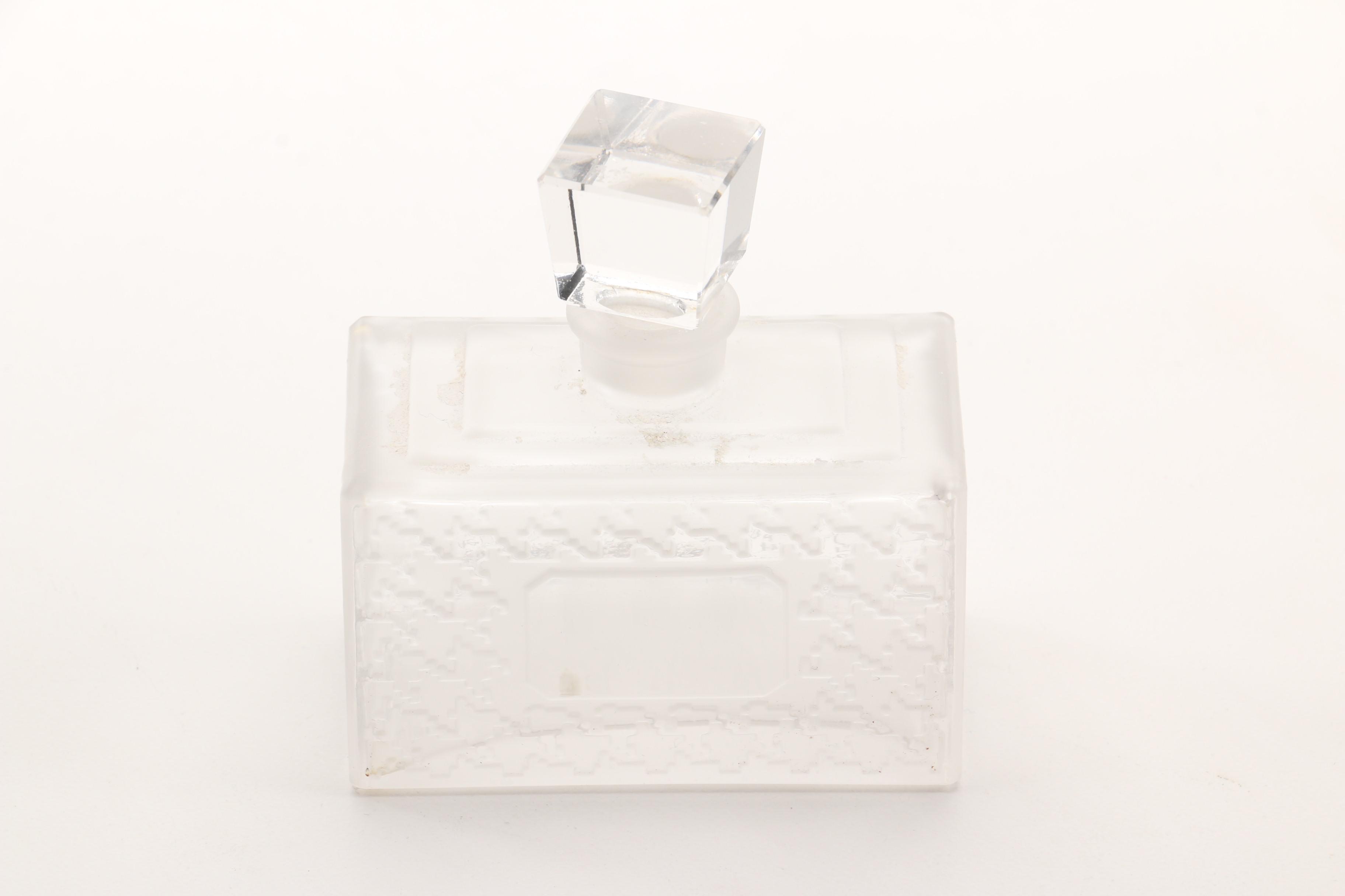 Christian Dior Perfume Bottle and Other Bottles Featuring Sterling