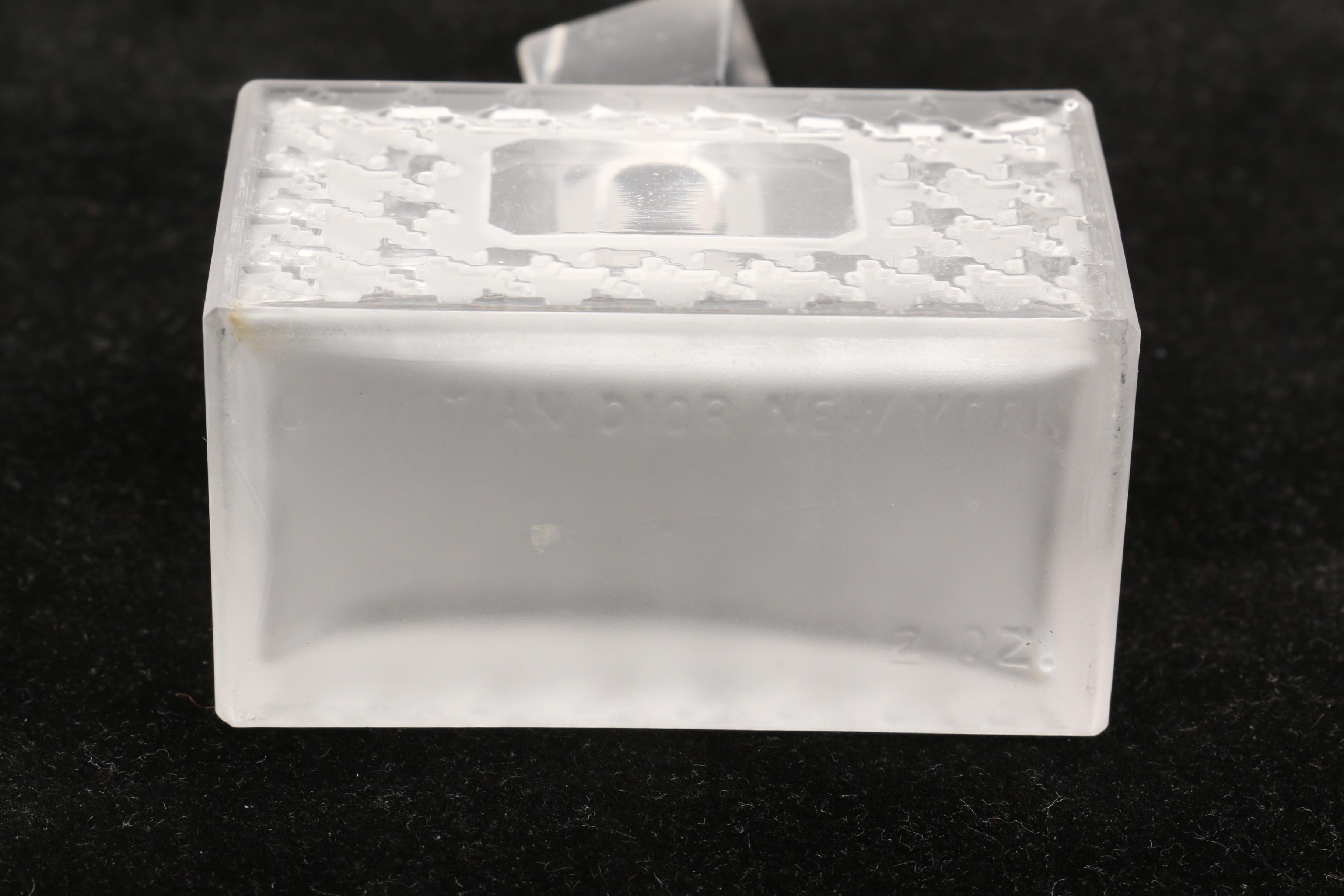 Christian Dior Perfume Bottle and Other Bottles Featuring Sterling