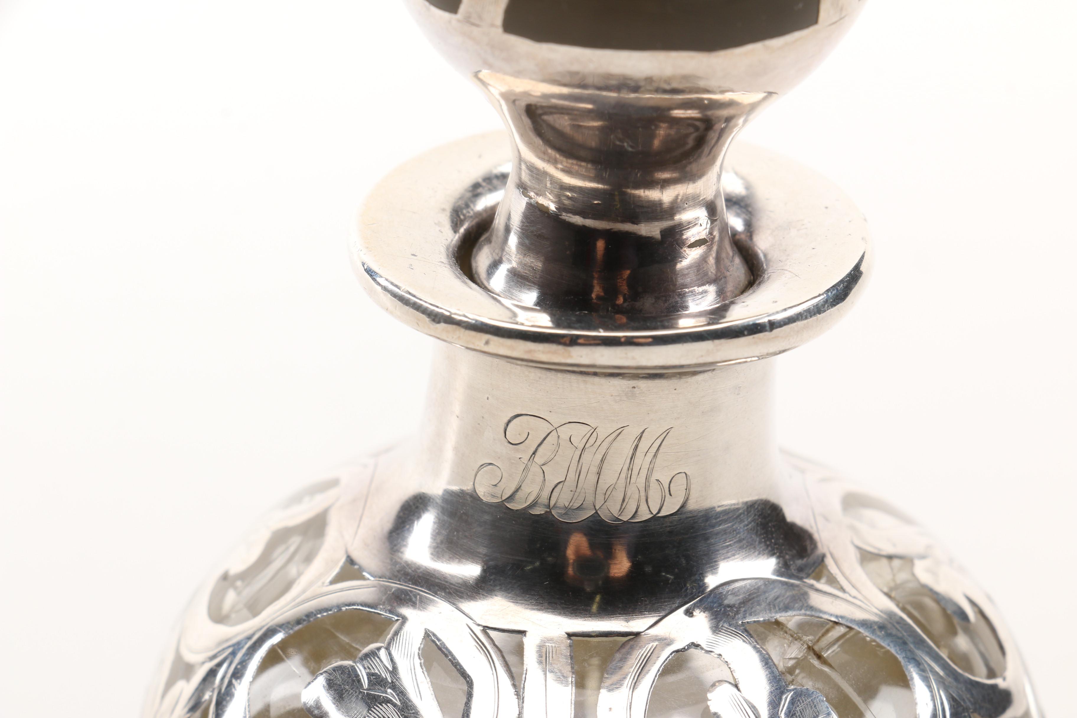 Christian Dior Perfume Bottle and Other Bottles Featuring Sterling