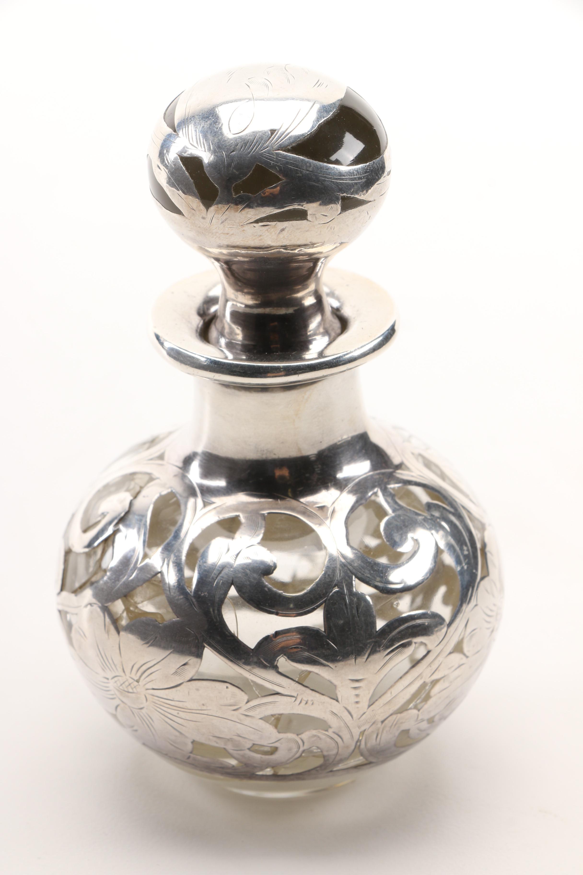 Christian Dior Perfume Bottle and Other Bottles Featuring Sterling