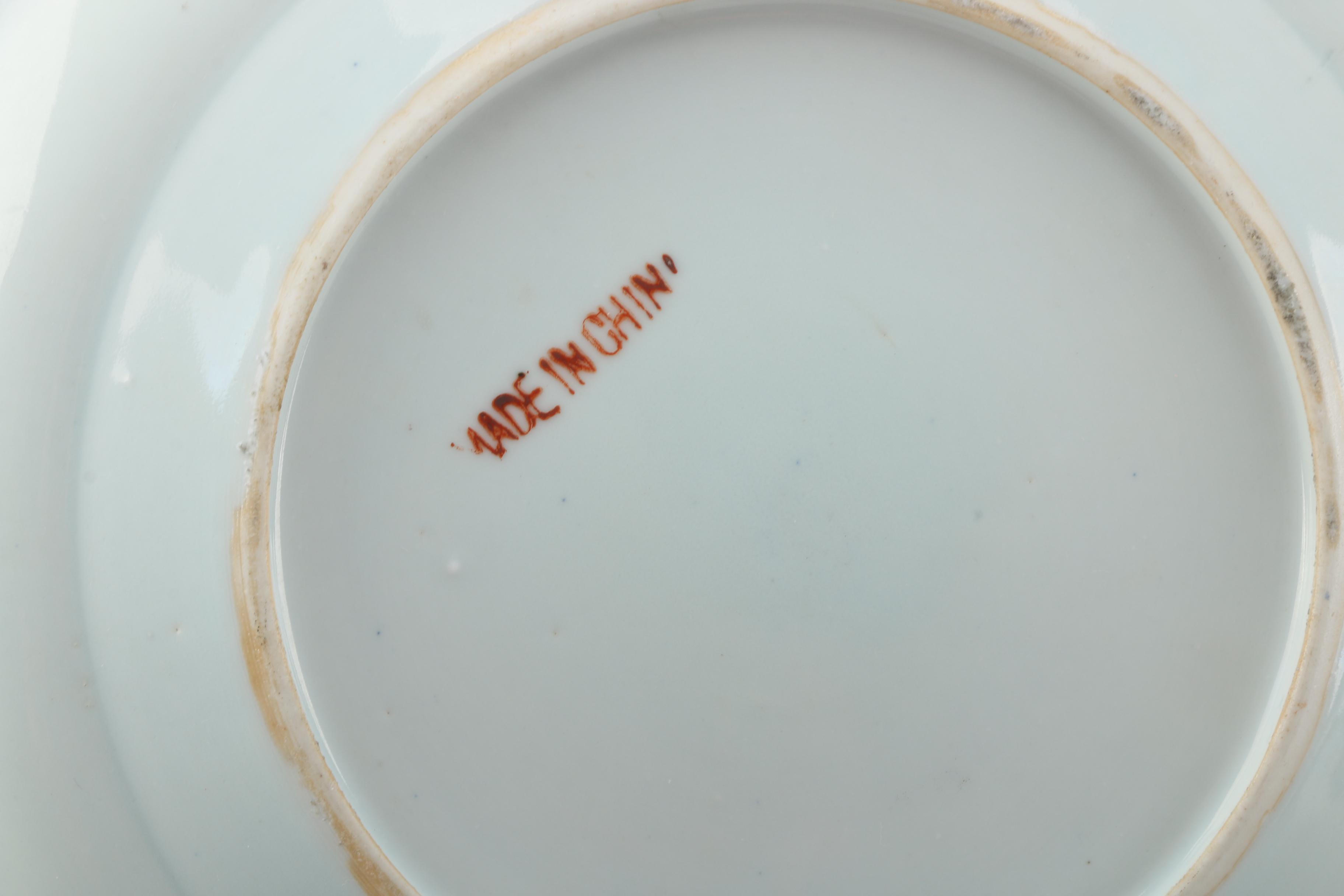 Three Decorative Porcelain Plates Featuring B. Altman