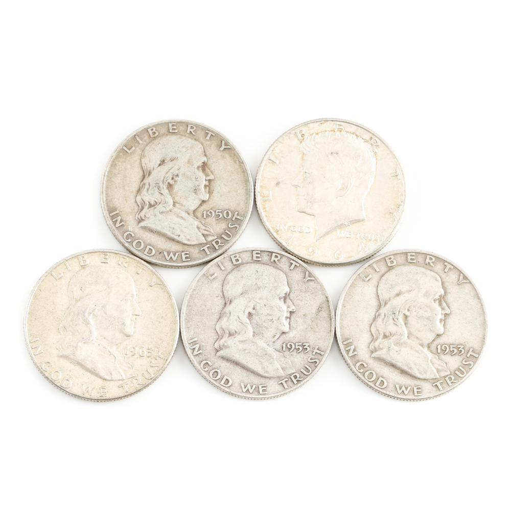 Four Franklin Silver Half Dollars and a Kennedy Silver Half Dollar