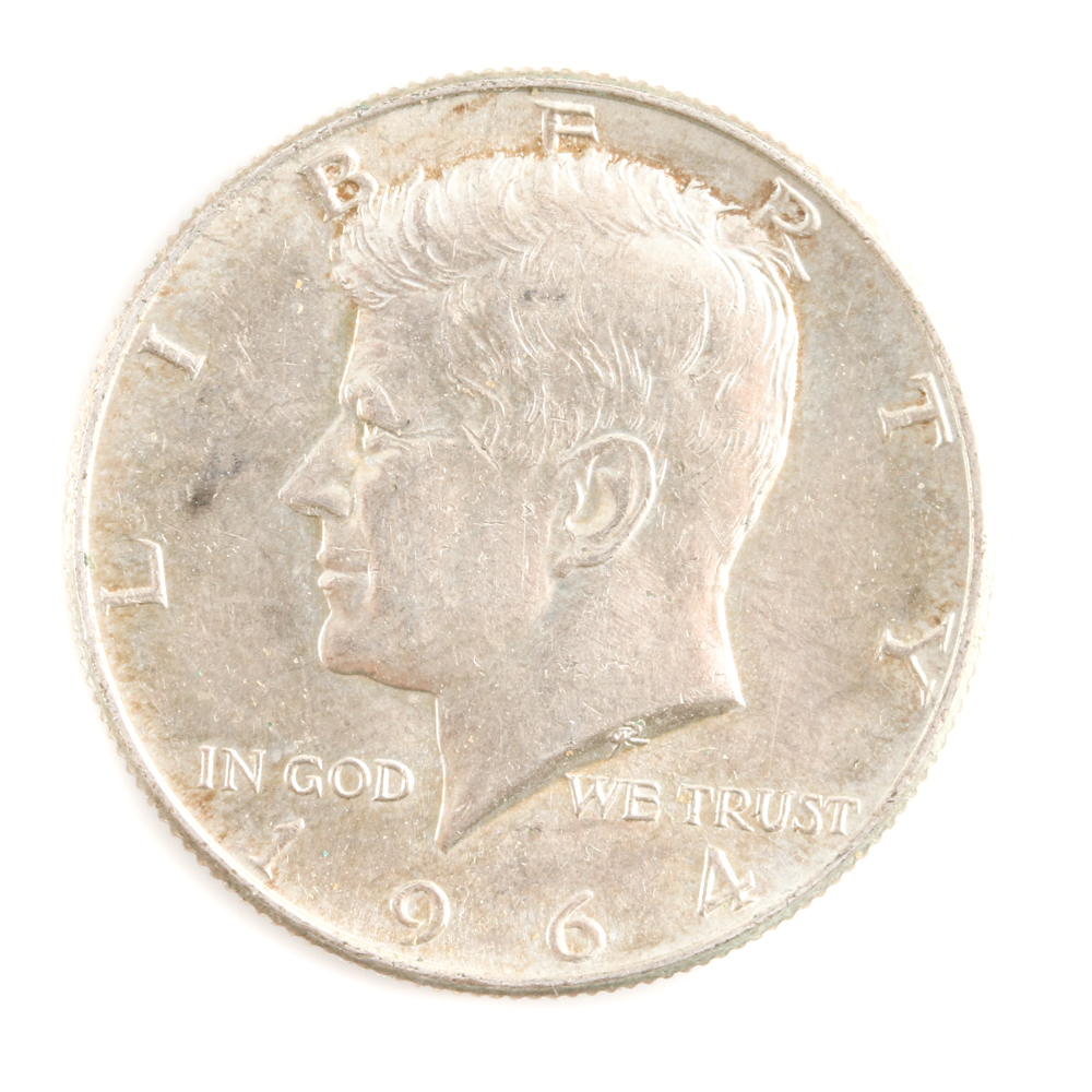 Four Franklin Silver Half Dollars and a Kennedy Silver Half Dollar