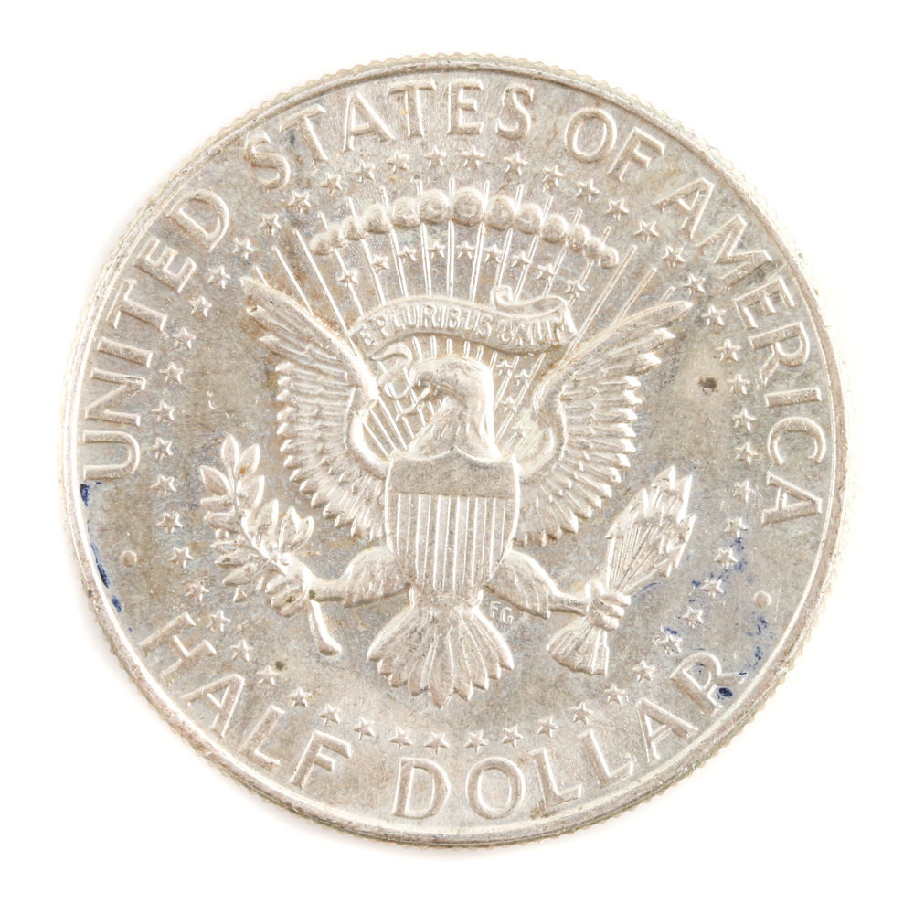 Four Franklin Silver Half Dollars and a Kennedy Silver Half Dollar