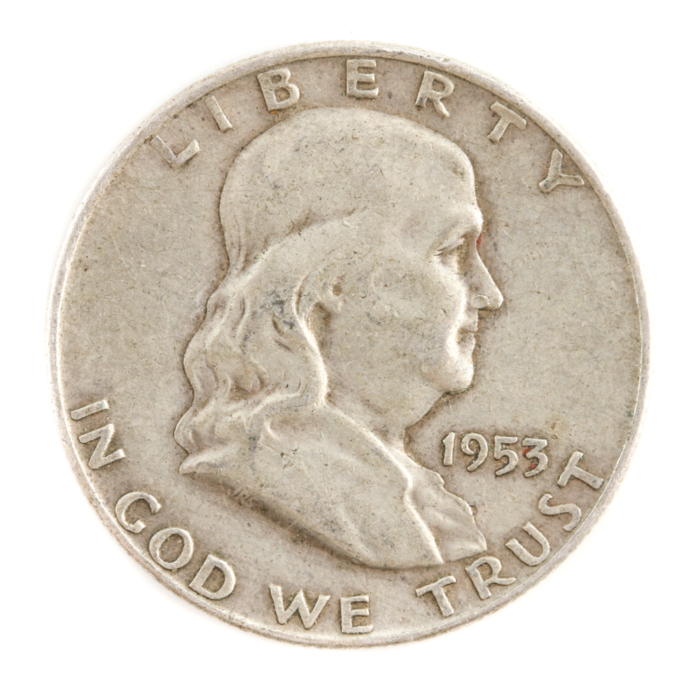 Four Franklin Silver Half Dollars and a Kennedy Silver Half Dollar