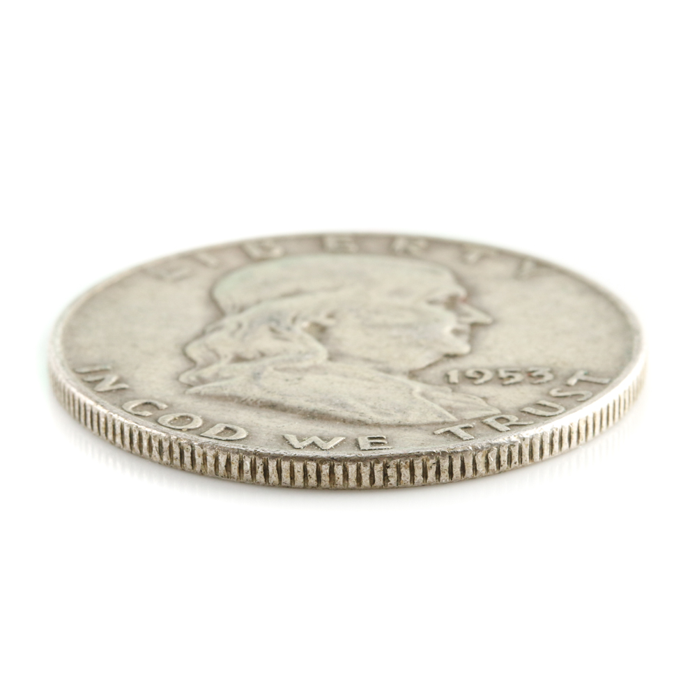 Four Franklin Silver Half Dollars and a Kennedy Silver Half Dollar