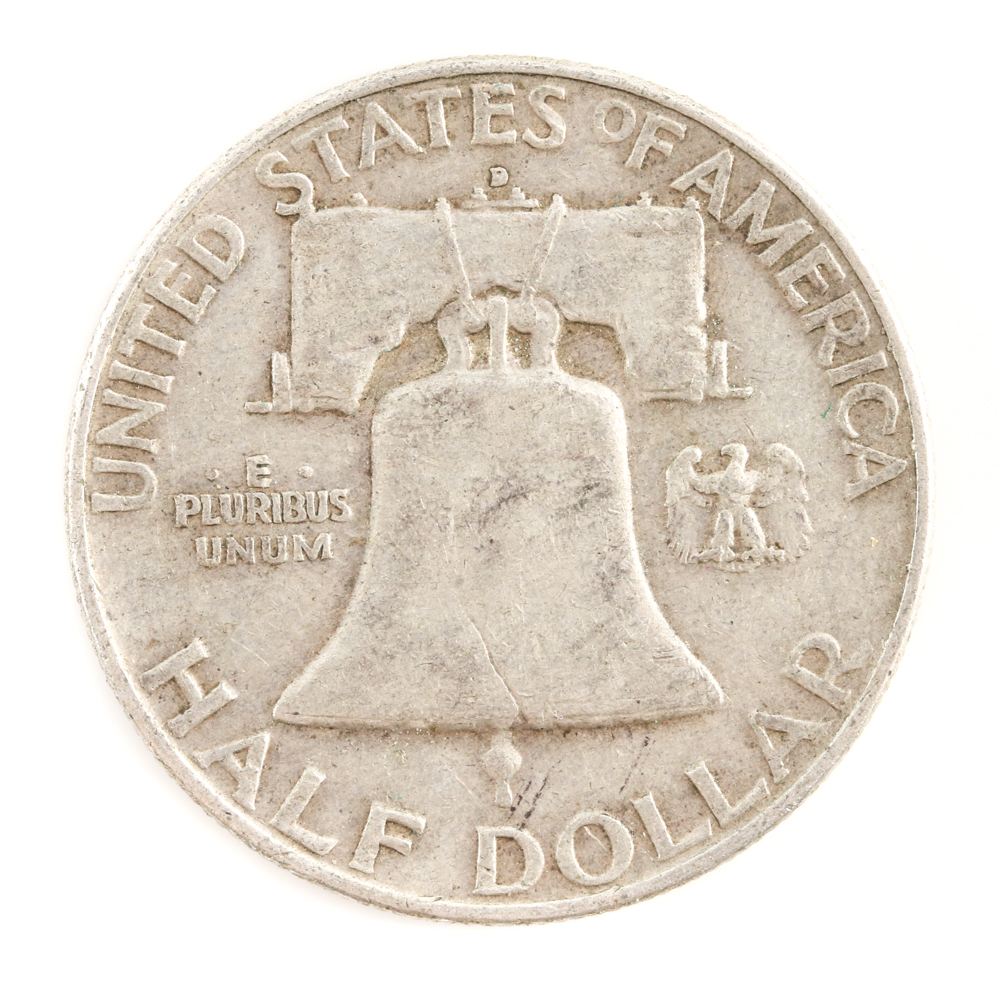 Four Franklin Silver Half Dollars and a Kennedy Silver Half Dollar