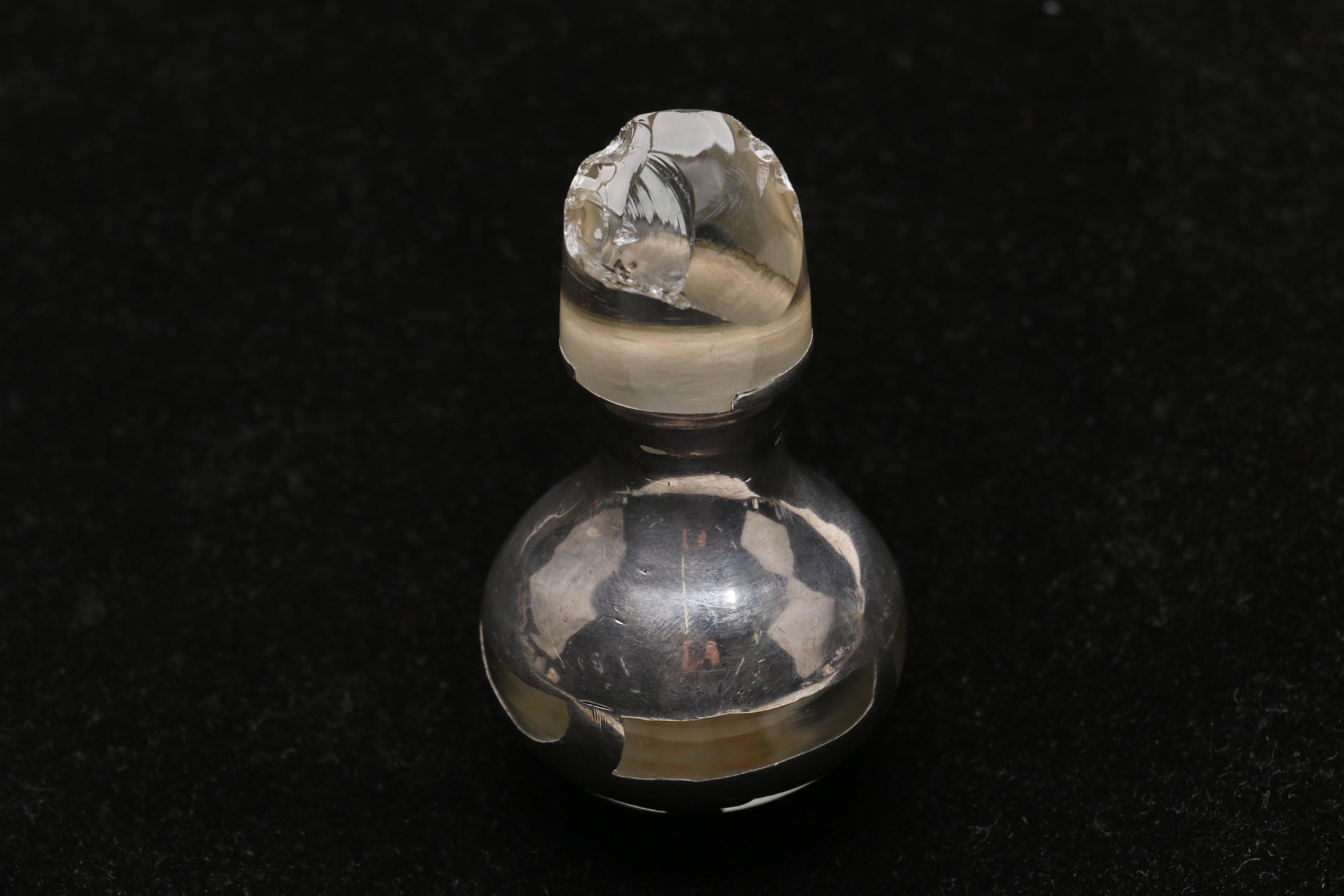 Christian Dior Perfume Bottle and Other Bottles Featuring Sterling