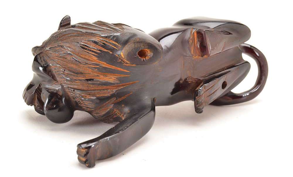 Antique Hand Carved Cherry Amber Lion Finial