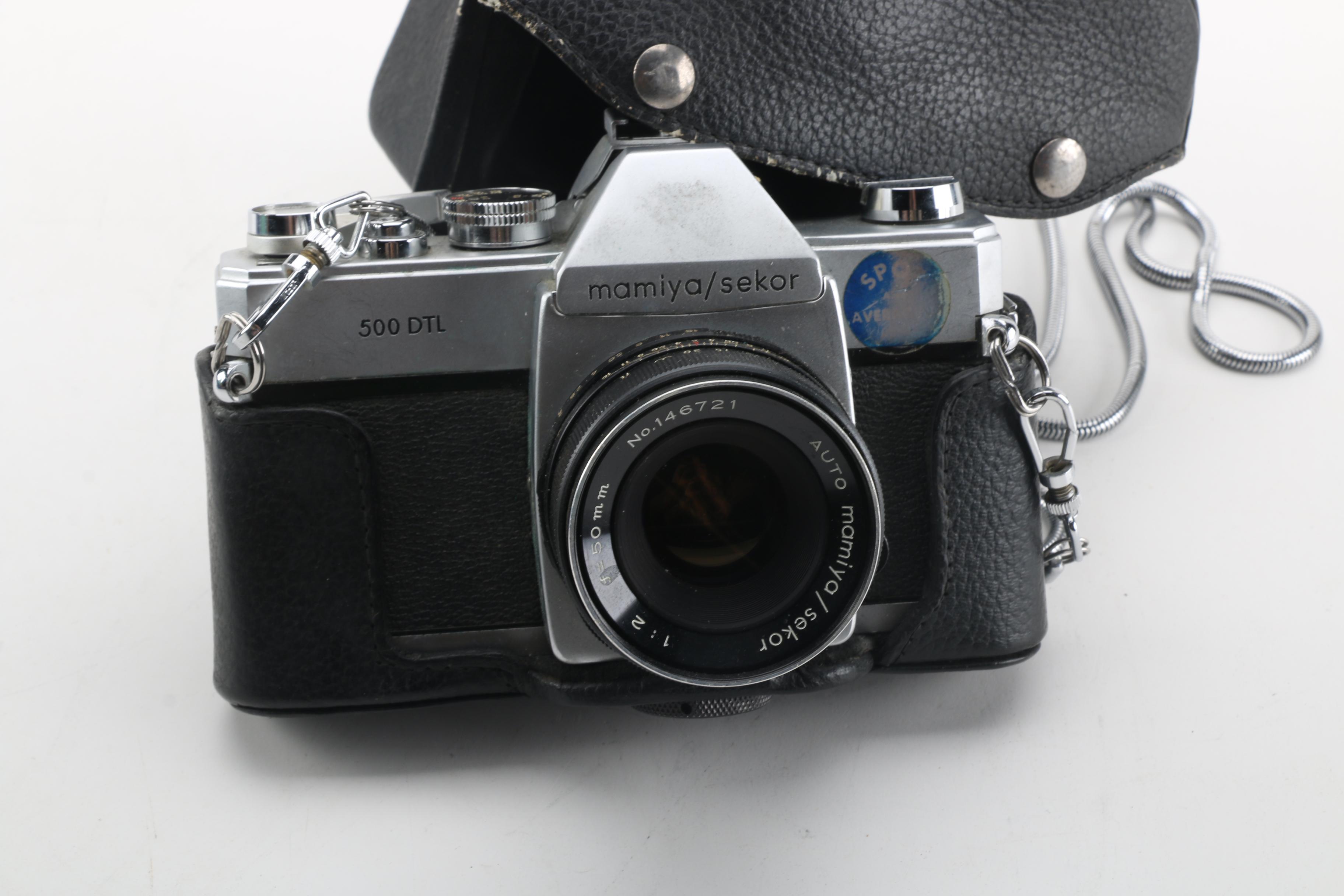 Mamiya/Sekor 500 DTL 35MM Film Camera with Sunpak 411 Thyristor Flash