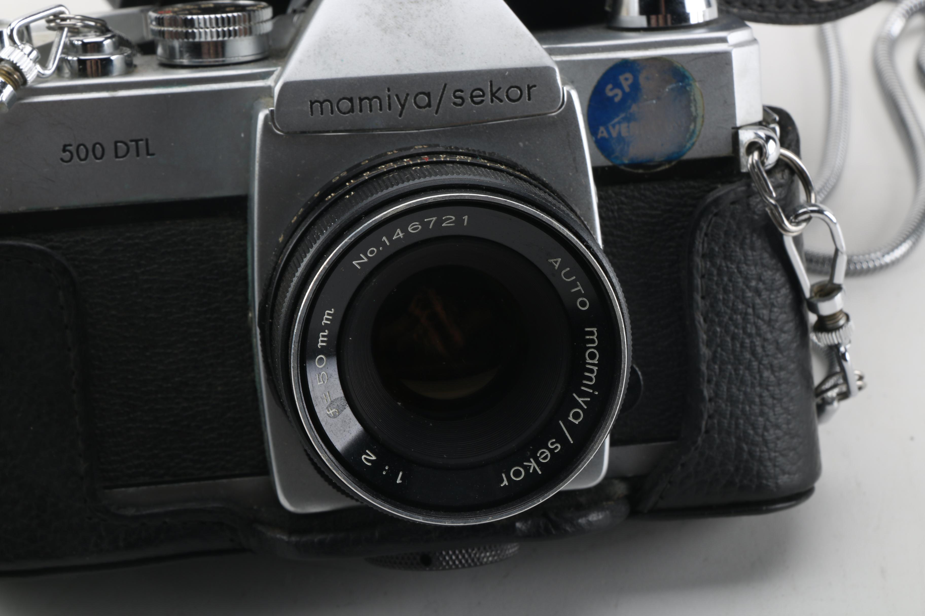 Mamiya/Sekor 500 DTL 35MM Film Camera with Sunpak 411 Thyristor Flash
