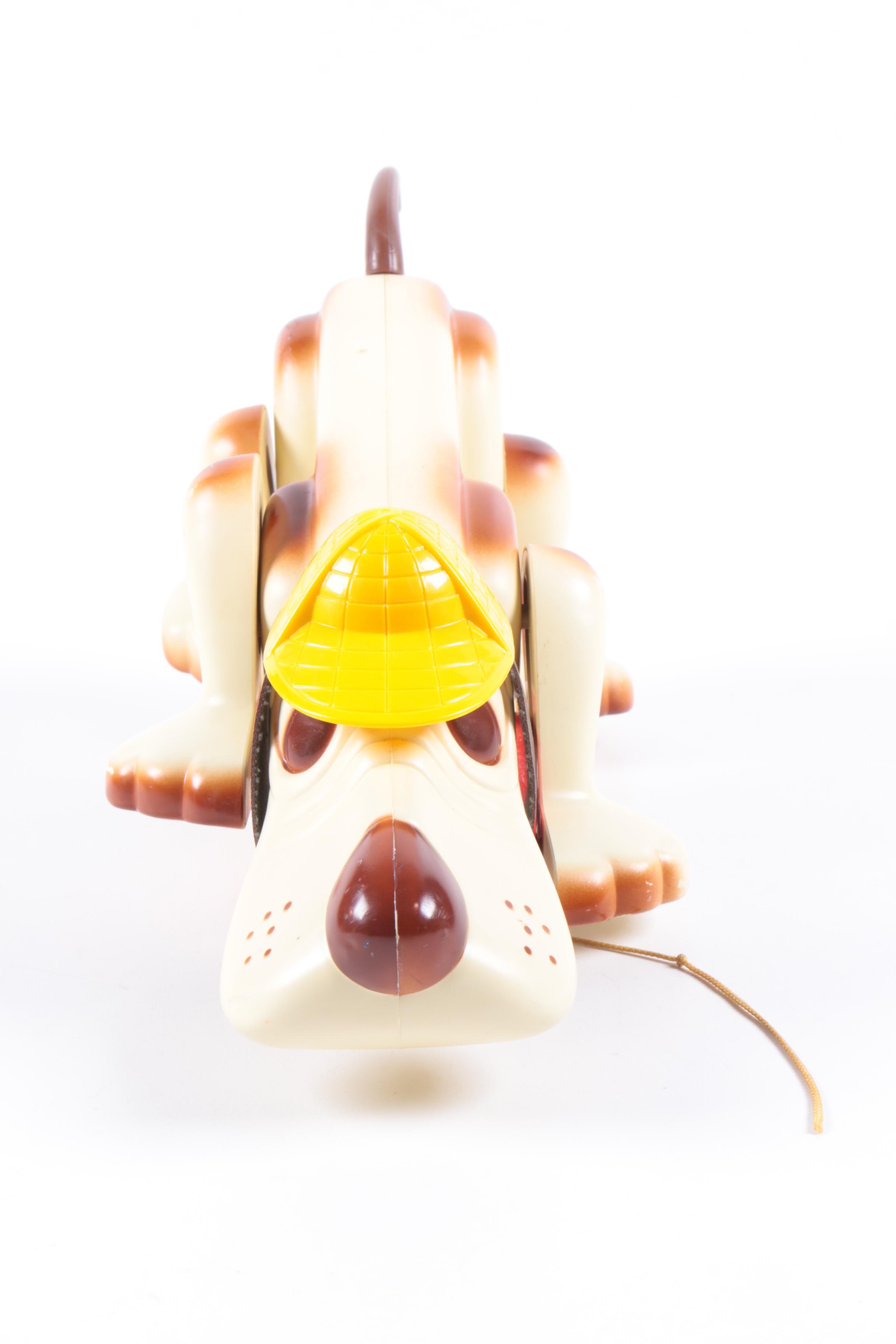 Plush Dolls and Plastic Pull-Toy Dog