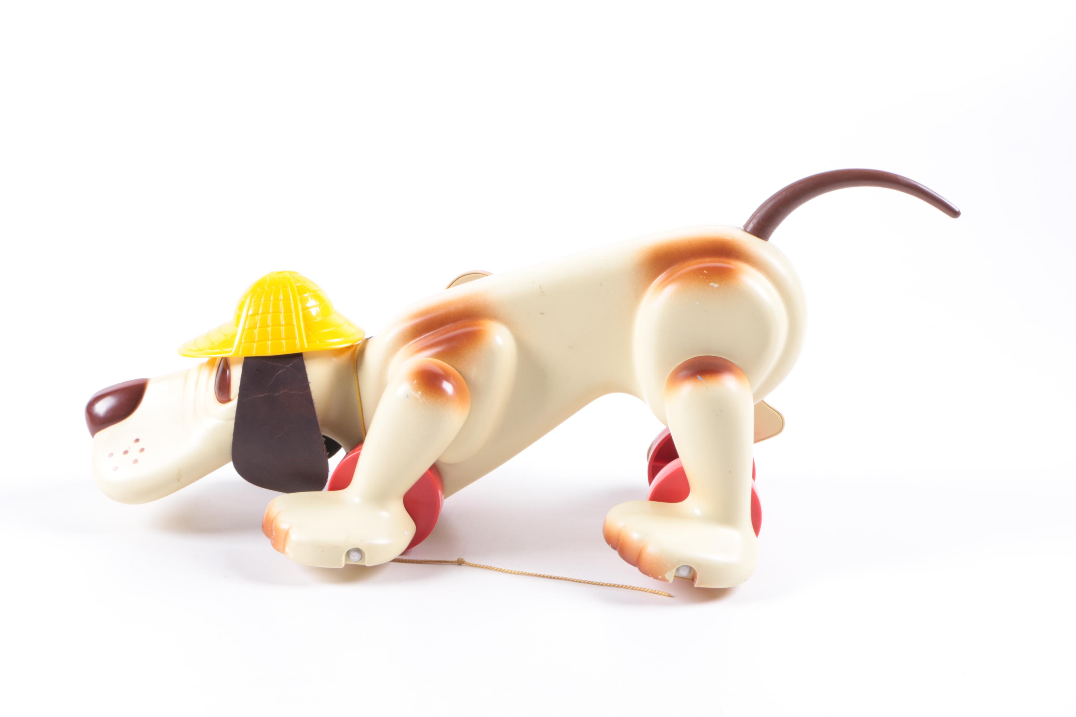 Plush Dolls and Plastic Pull-Toy Dog