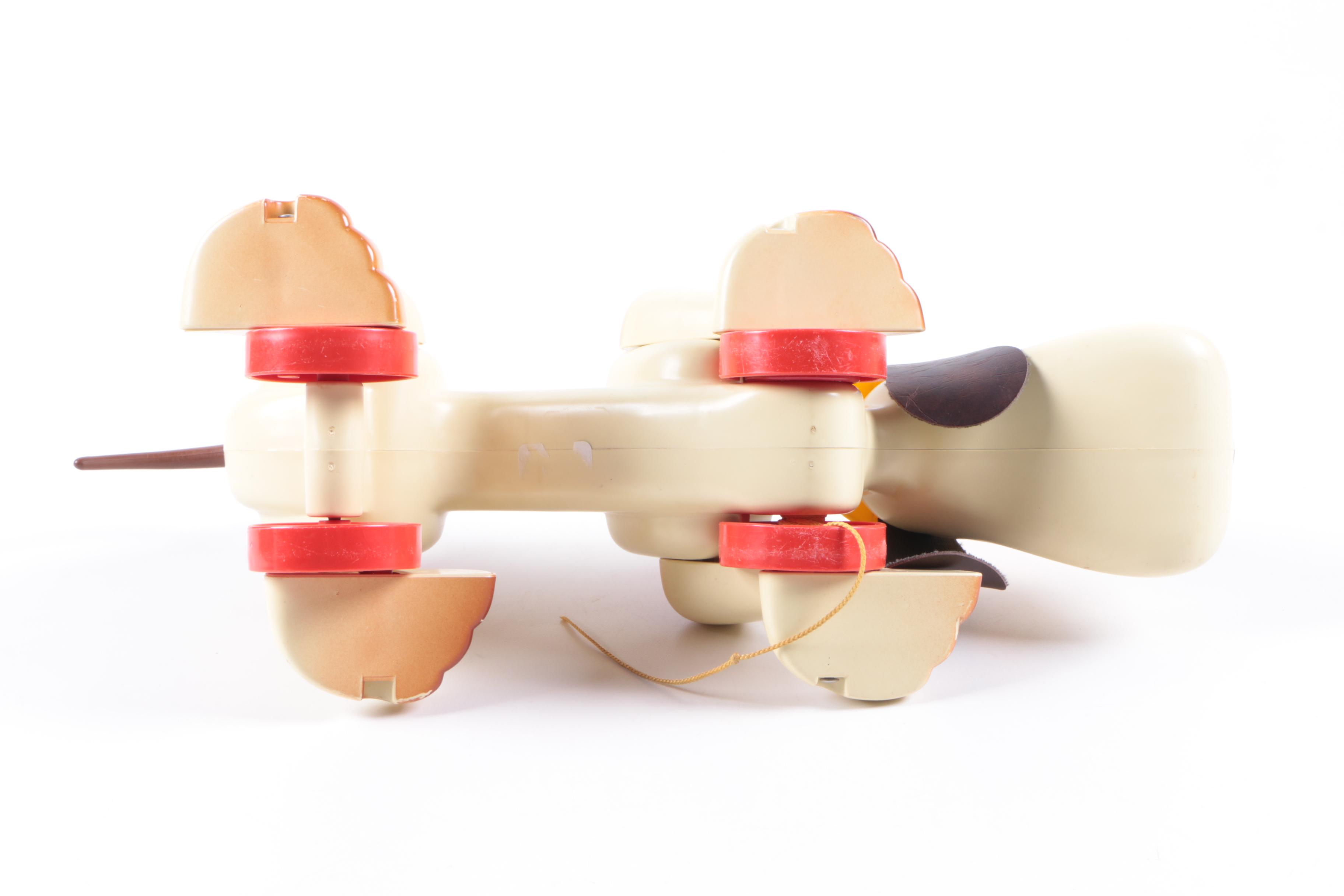 Plush Dolls and Plastic Pull-Toy Dog