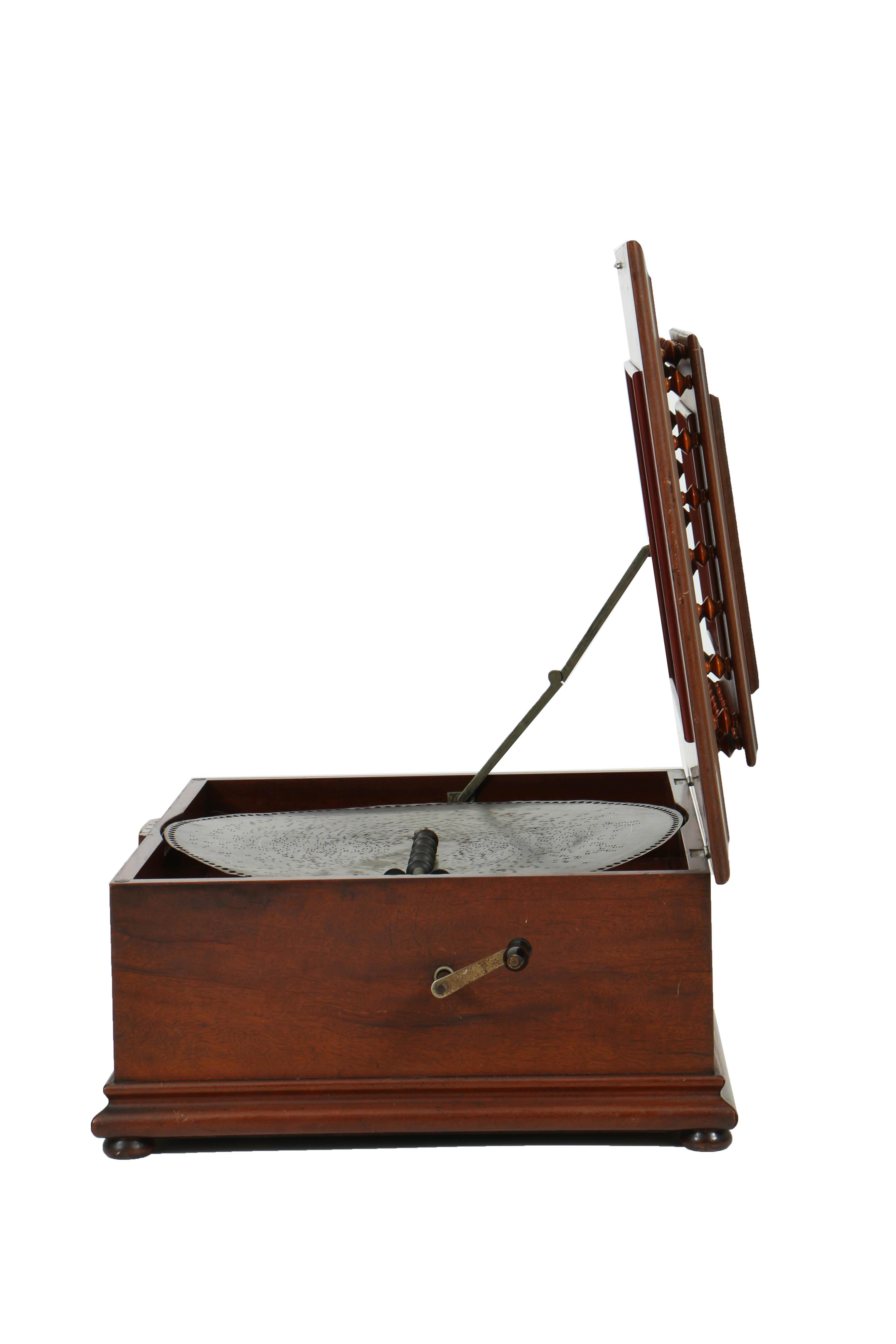 Rare 1890's Regina 20.75" Mahogany Music Player with Cupola Top and Fifty Discs