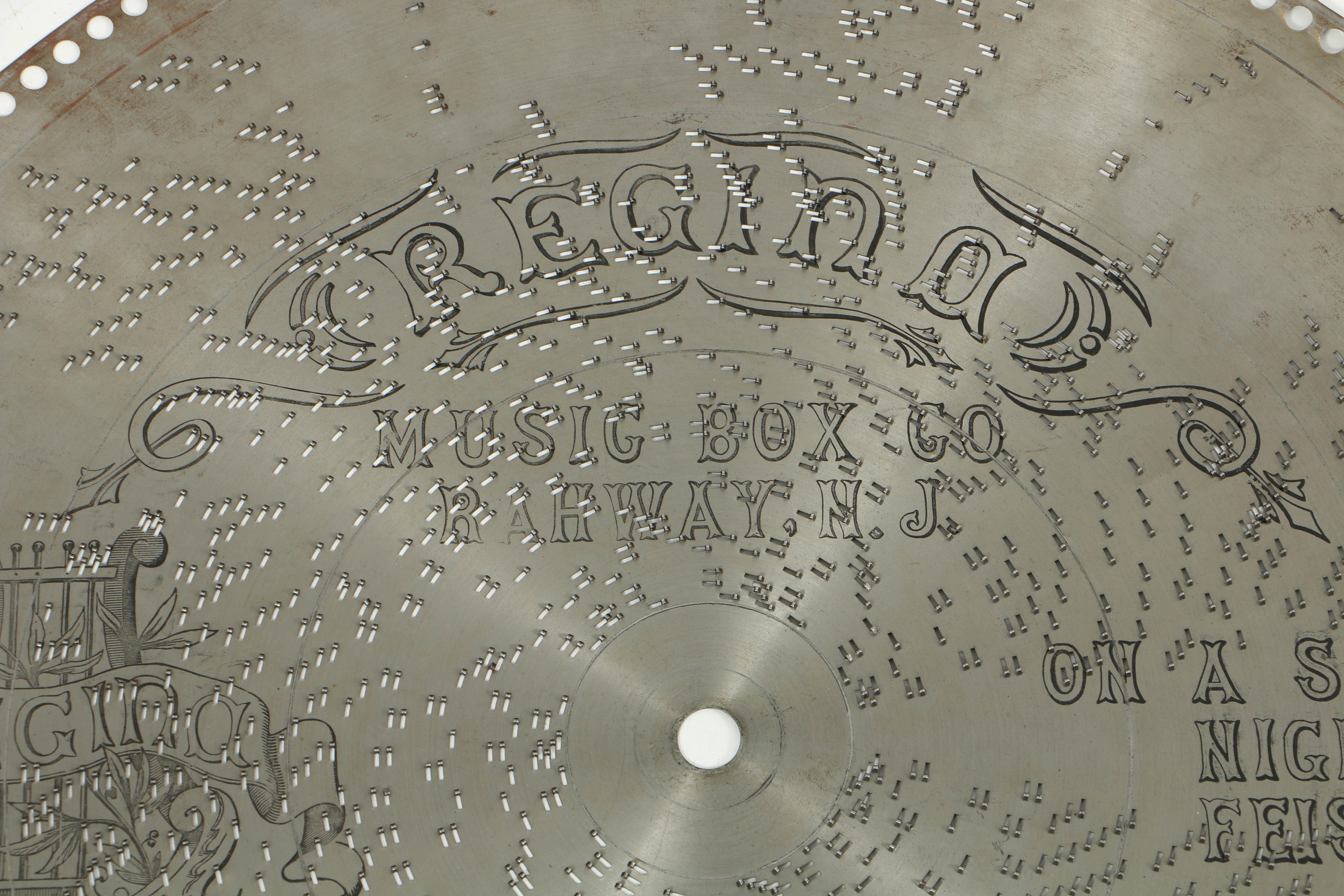 Rare 1890's Regina 20.75" Mahogany Music Player with Cupola Top and Fifty Discs