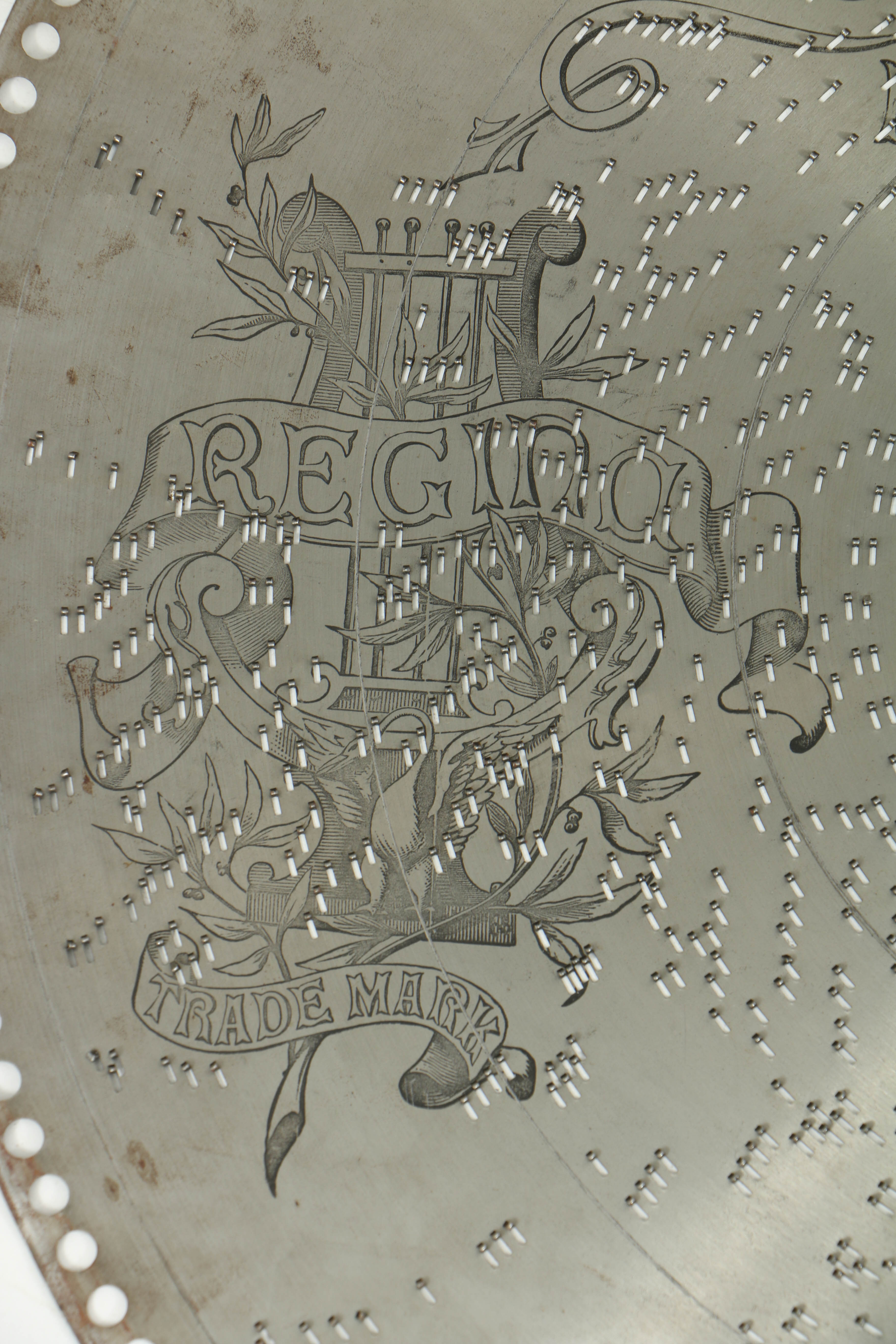 Rare 1890's Regina 20.75" Mahogany Music Player with Cupola Top and Fifty Discs