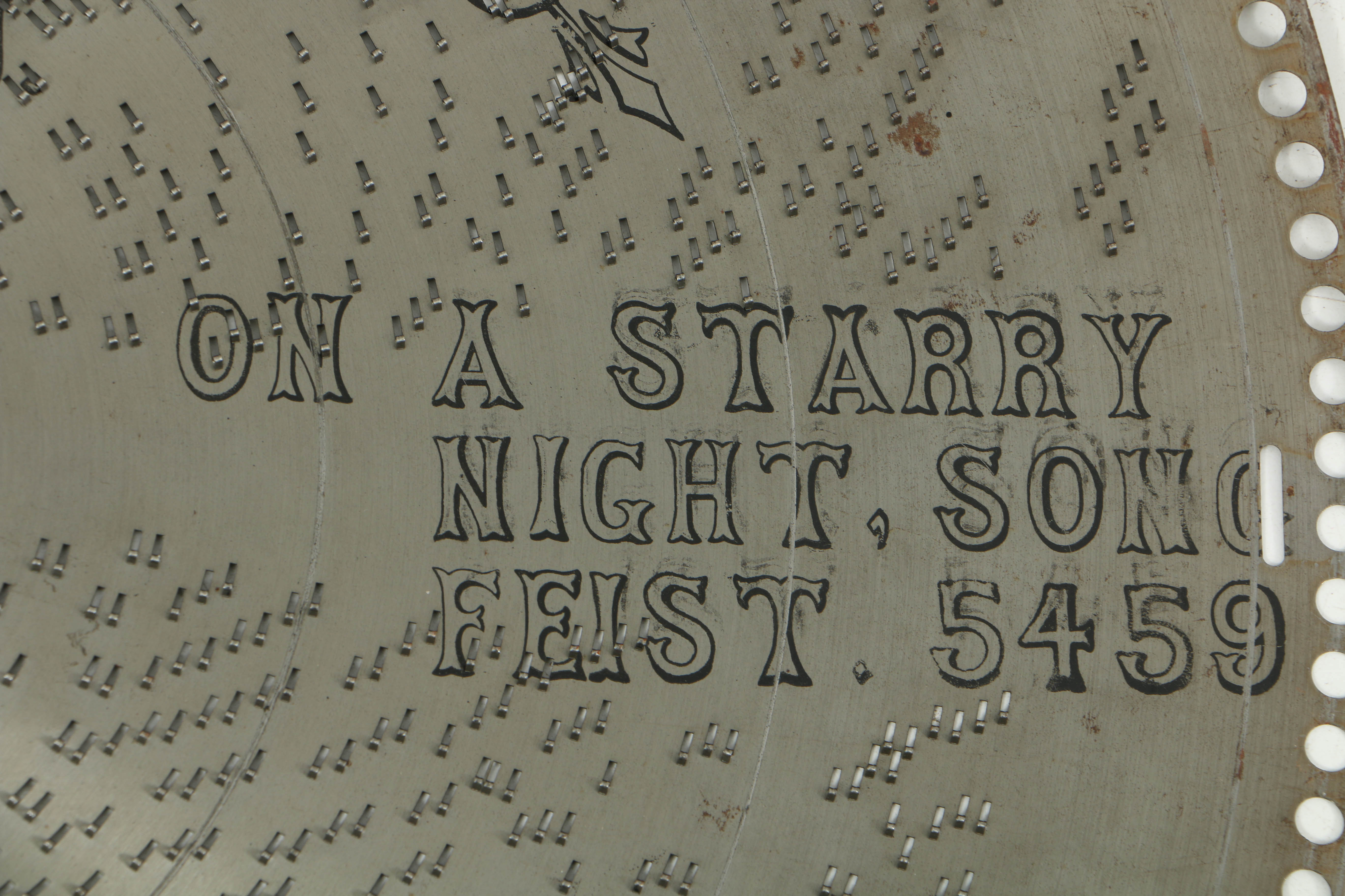 Rare 1890's Regina 20.75" Mahogany Music Player with Cupola Top and Fifty Discs