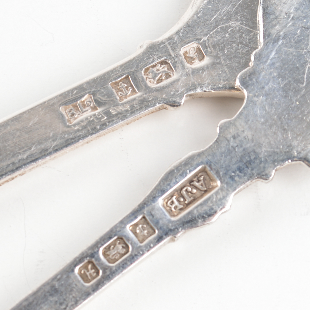 Seven Mixed Assay Silver Souvenir Spoons