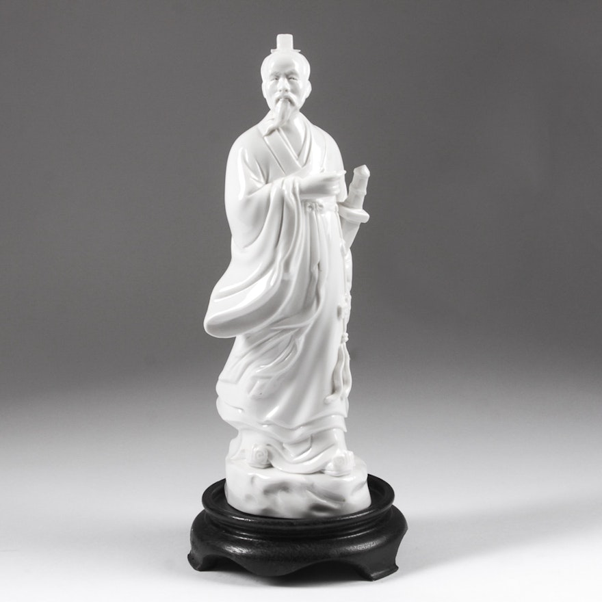 Blanc-de-Chine Porcelain Statue of a Man with Sword