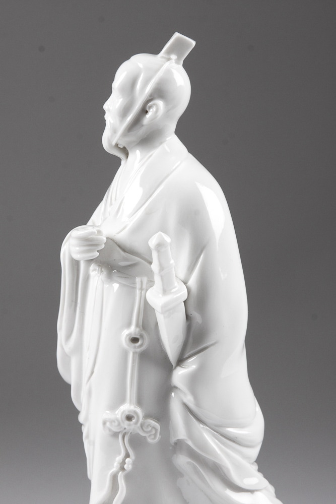 Blanc-de-Chine Porcelain Statue of a Man with Sword