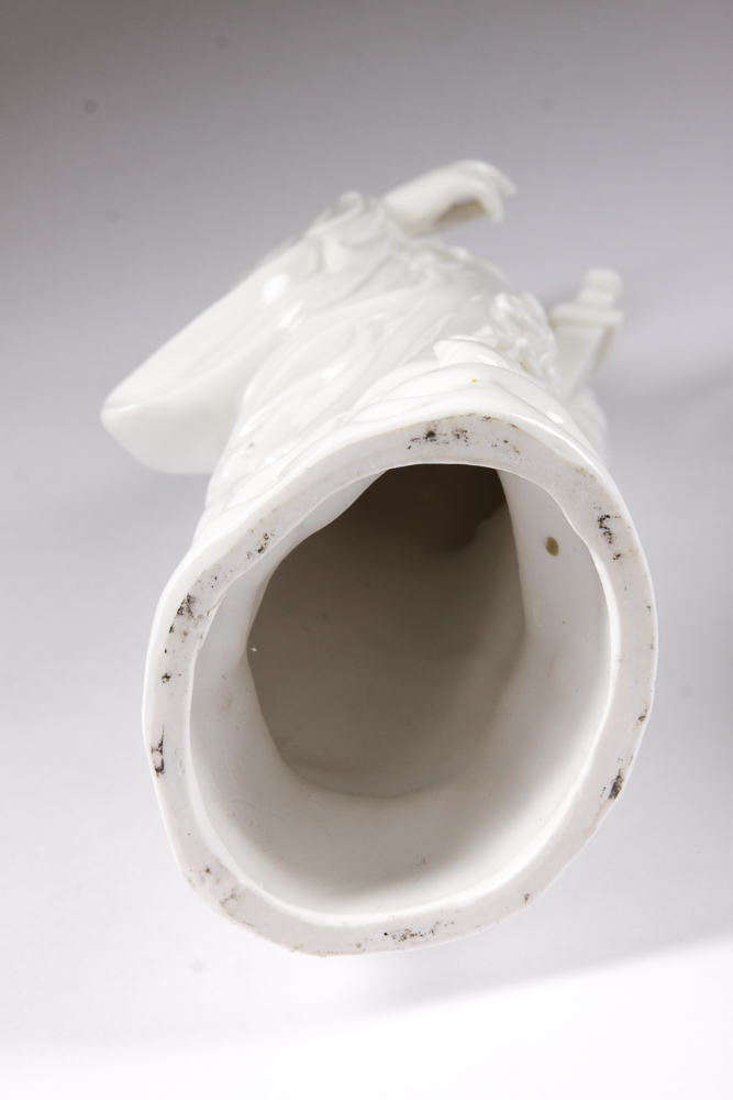 Blanc-de-Chine Porcelain Statue of a Man with Sword