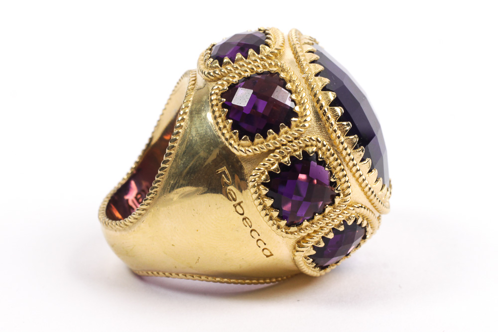 Rebecca Designer Gold Tone Ring with Purple Amethysts