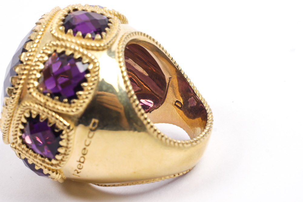 Rebecca Designer Gold Tone Ring with Purple Amethysts