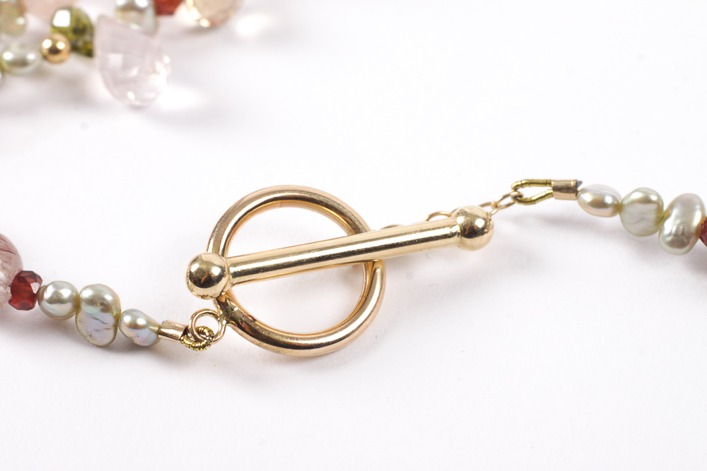 14K Gold and Gemstone Bead Necklace with a Vintage Costume Brooch Accent