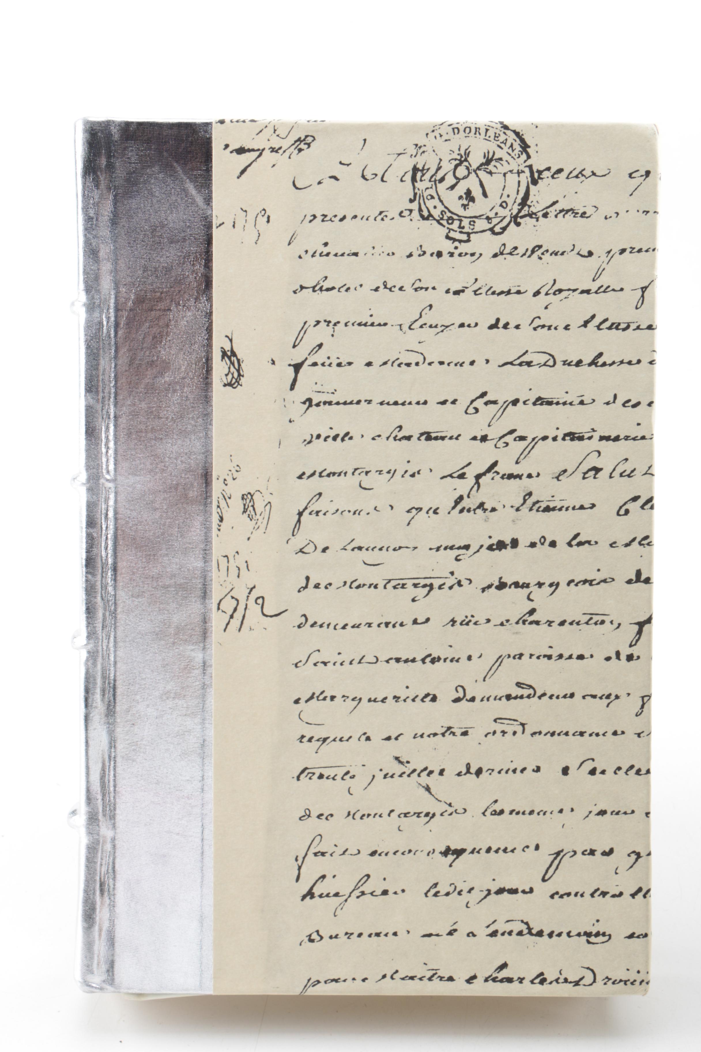 Collection of Hardcover Books featuing Custom Metallic Binding