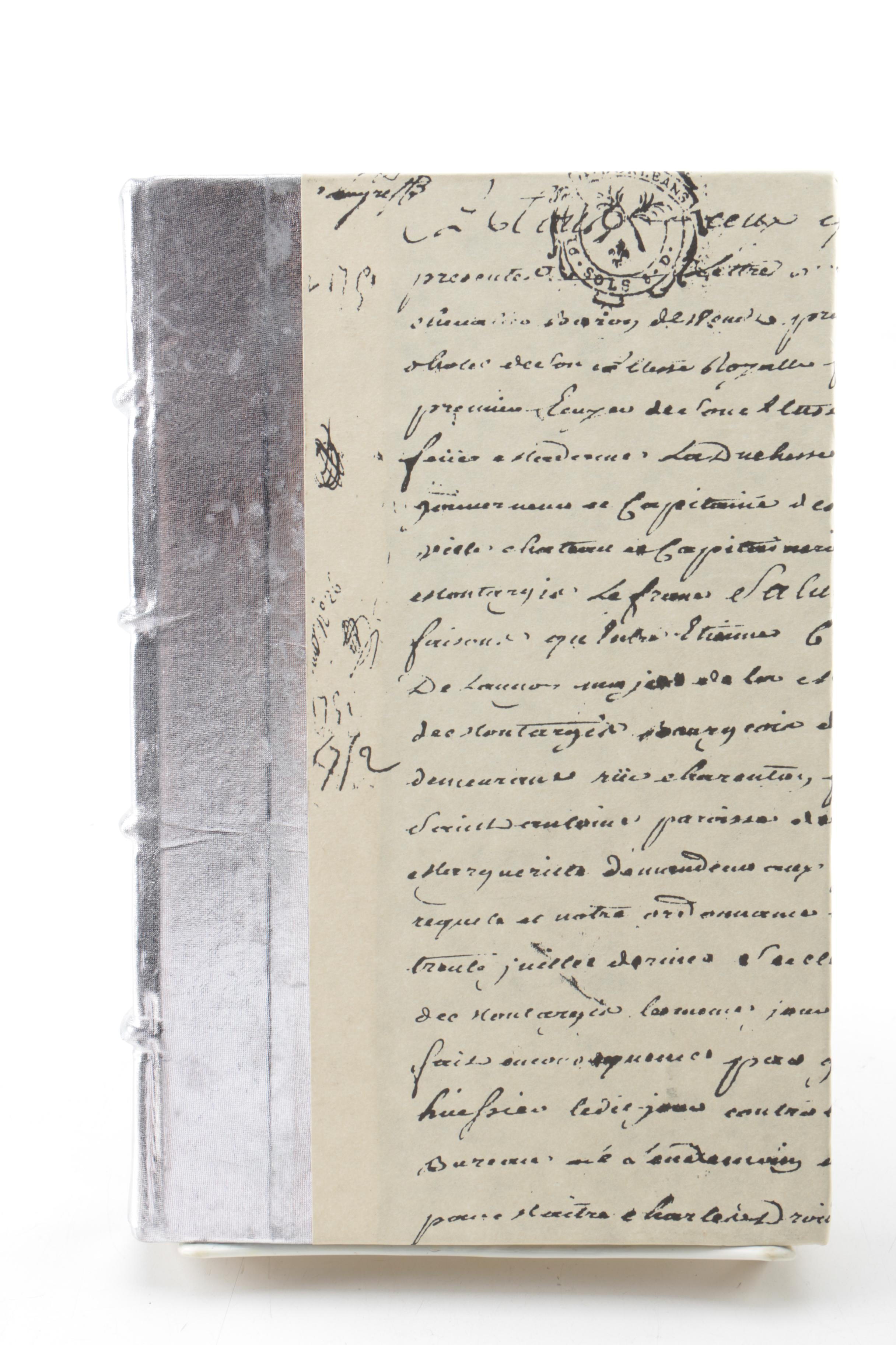 Collection of Hardcover Books featuing Custom Metallic Binding