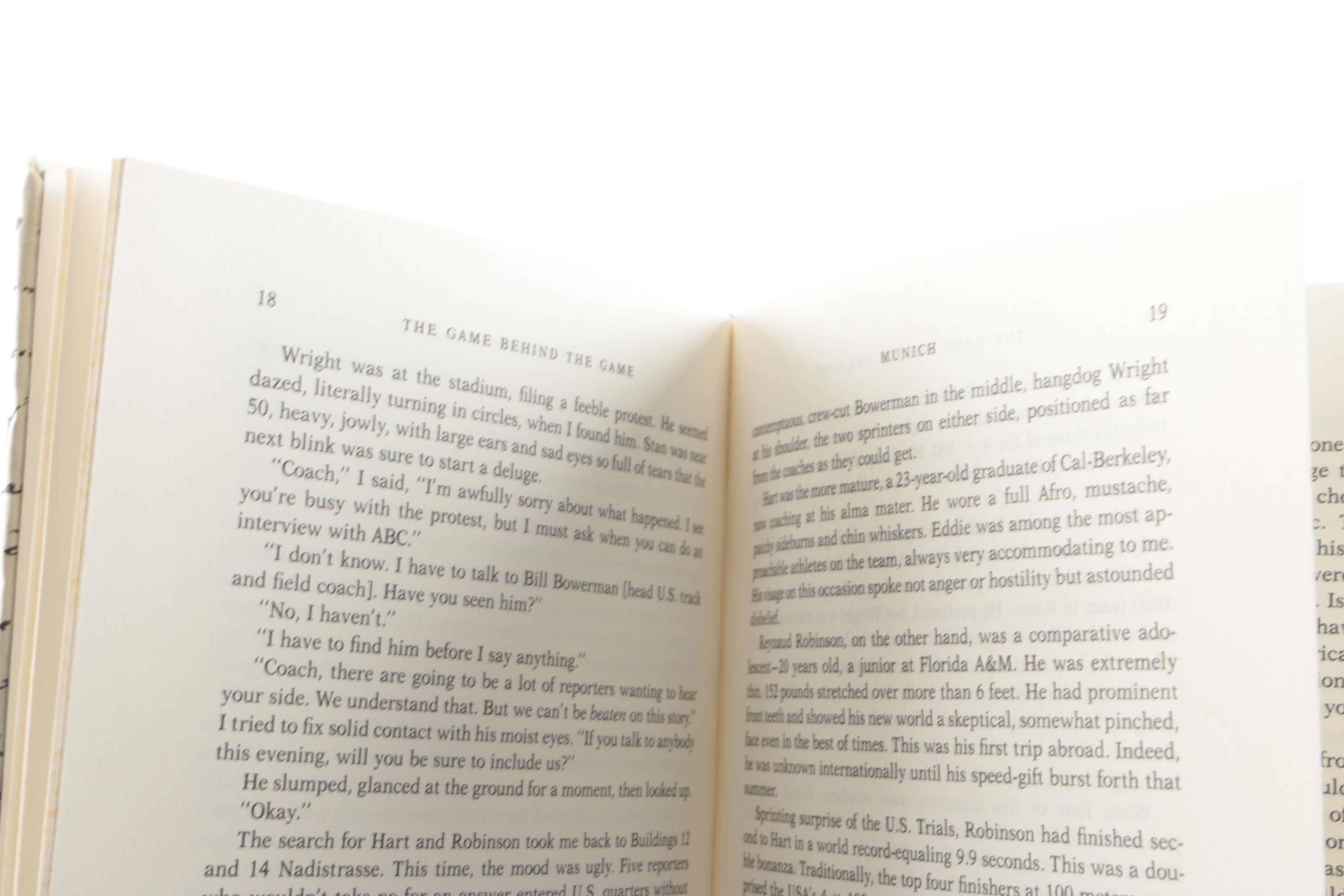 Collection of Hardcover Books featuing Custom Metallic Binding