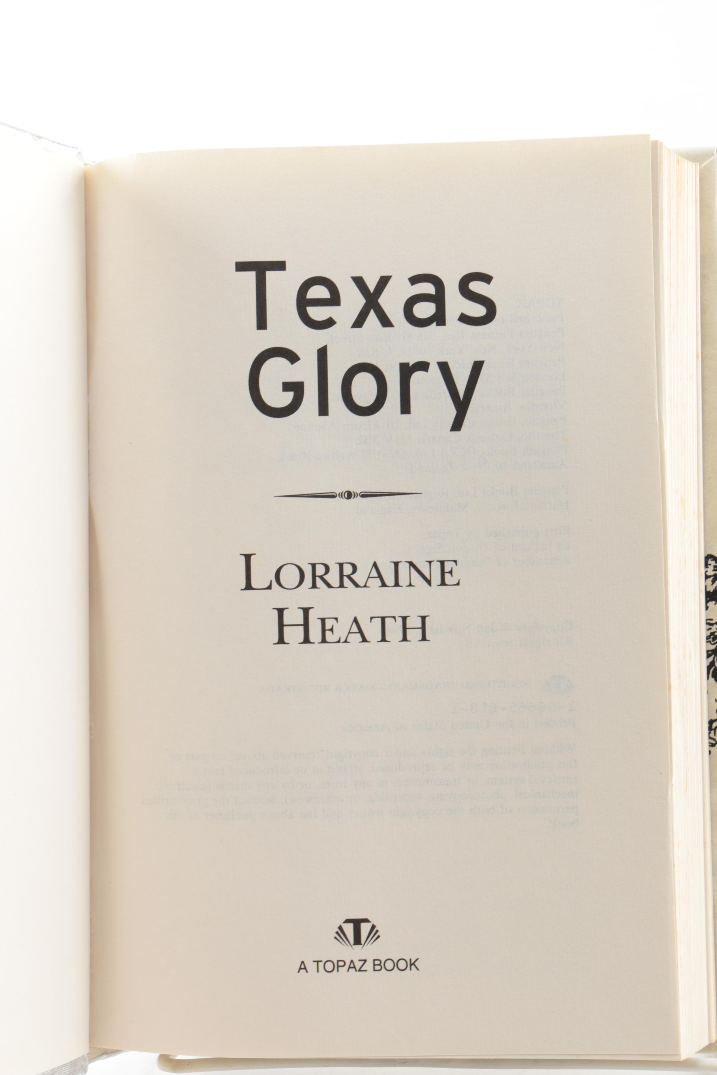 Collection of Hardcover Books featuing Custom Metallic Binding