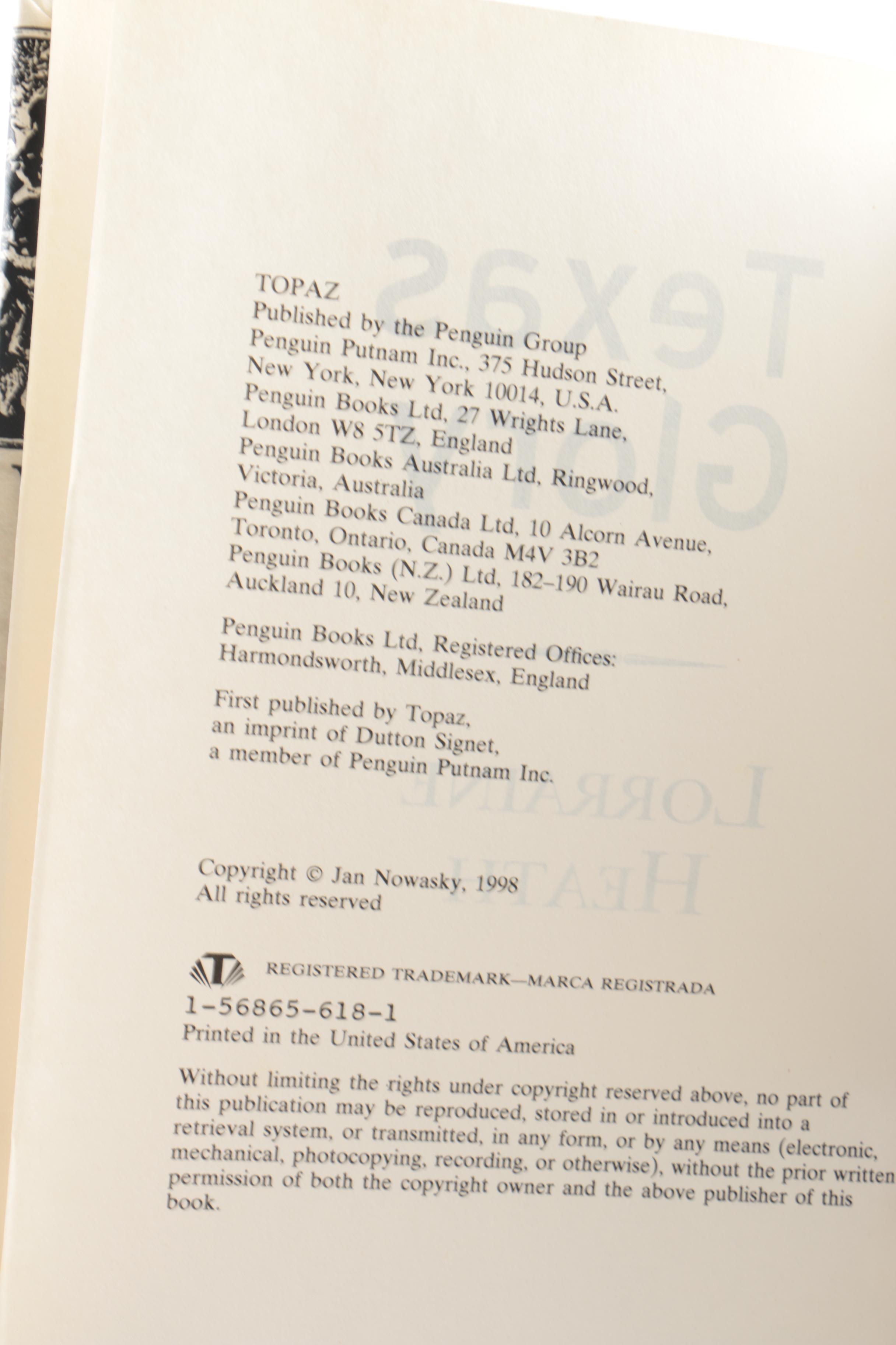 Collection of Hardcover Books featuing Custom Metallic Binding