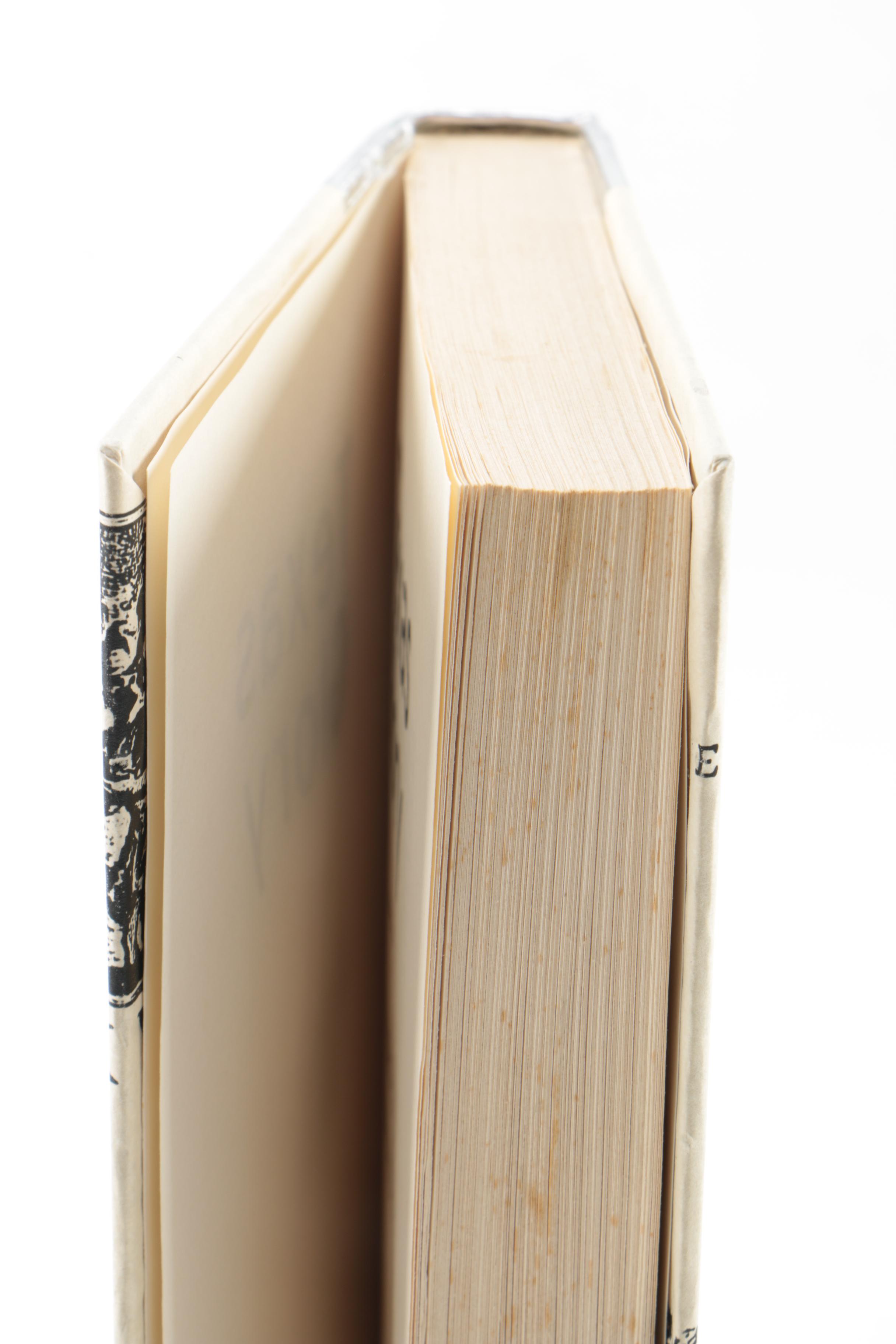 Collection of Hardcover Books featuing Custom Metallic Binding