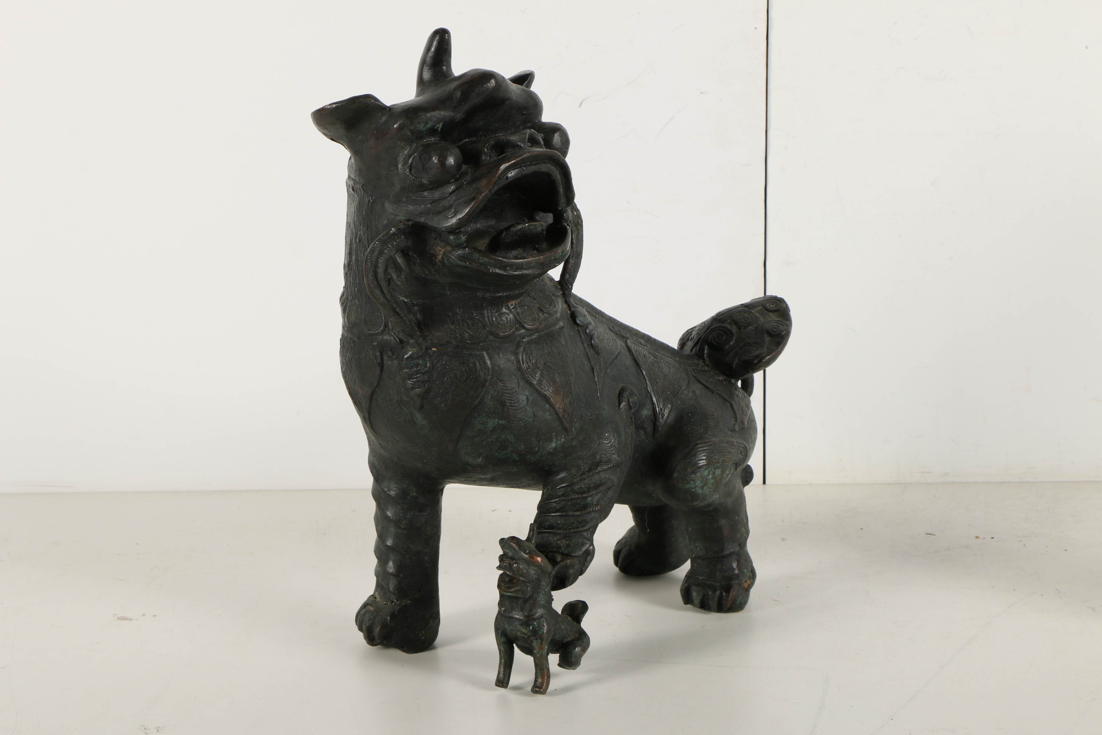 Vintage East Asian Leaded Copper Imperial Guardian Lion Sculptures