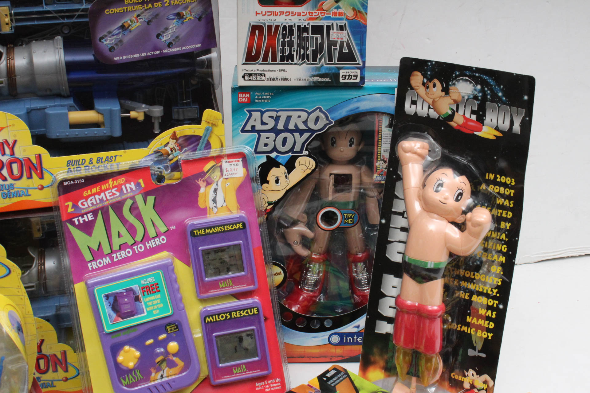 Action Figures Including "Jimmy Nutrino", "The Mask" and "Cosmic Boy"