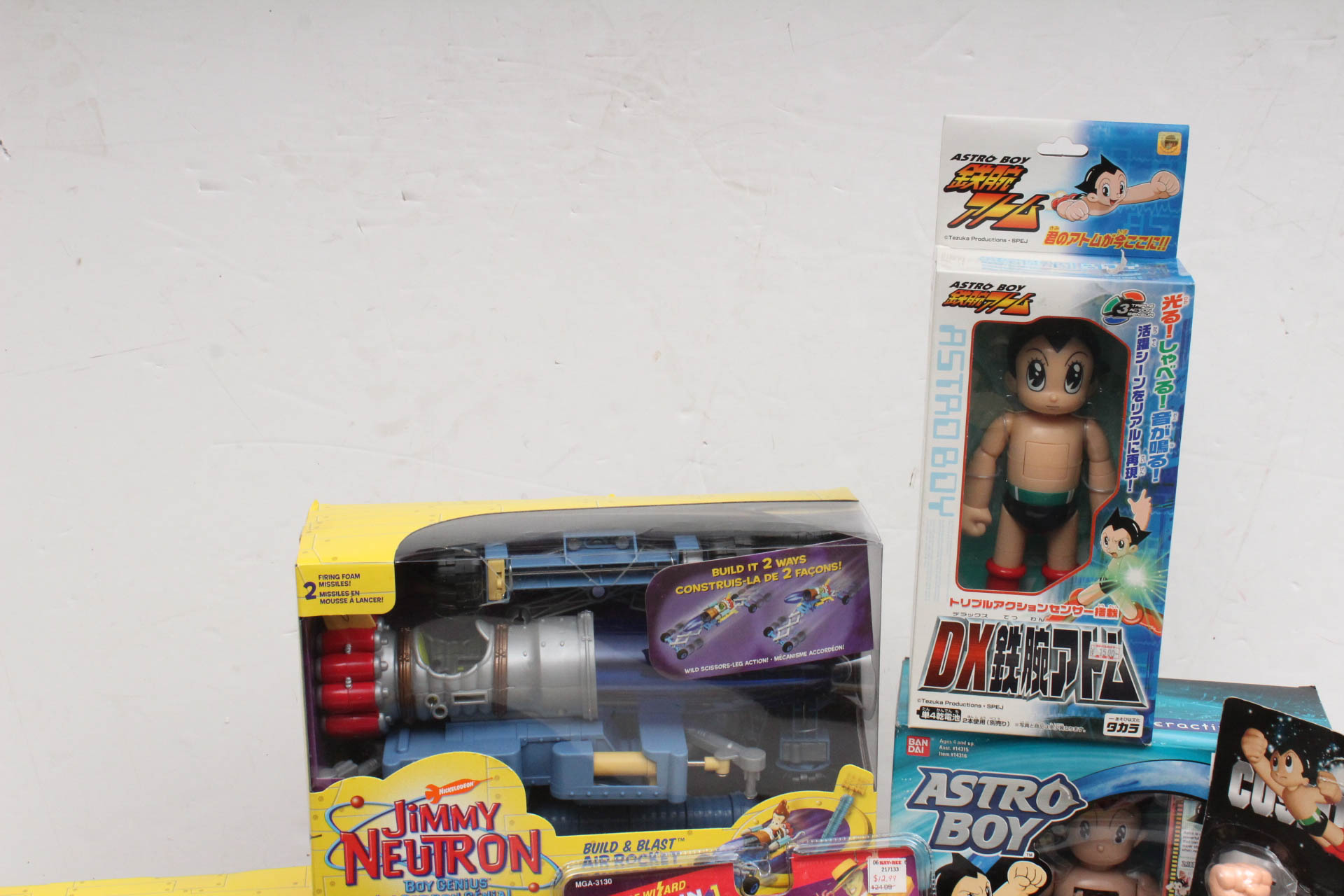 Action Figures Including "Jimmy Nutrino", "The Mask" and "Cosmic Boy"