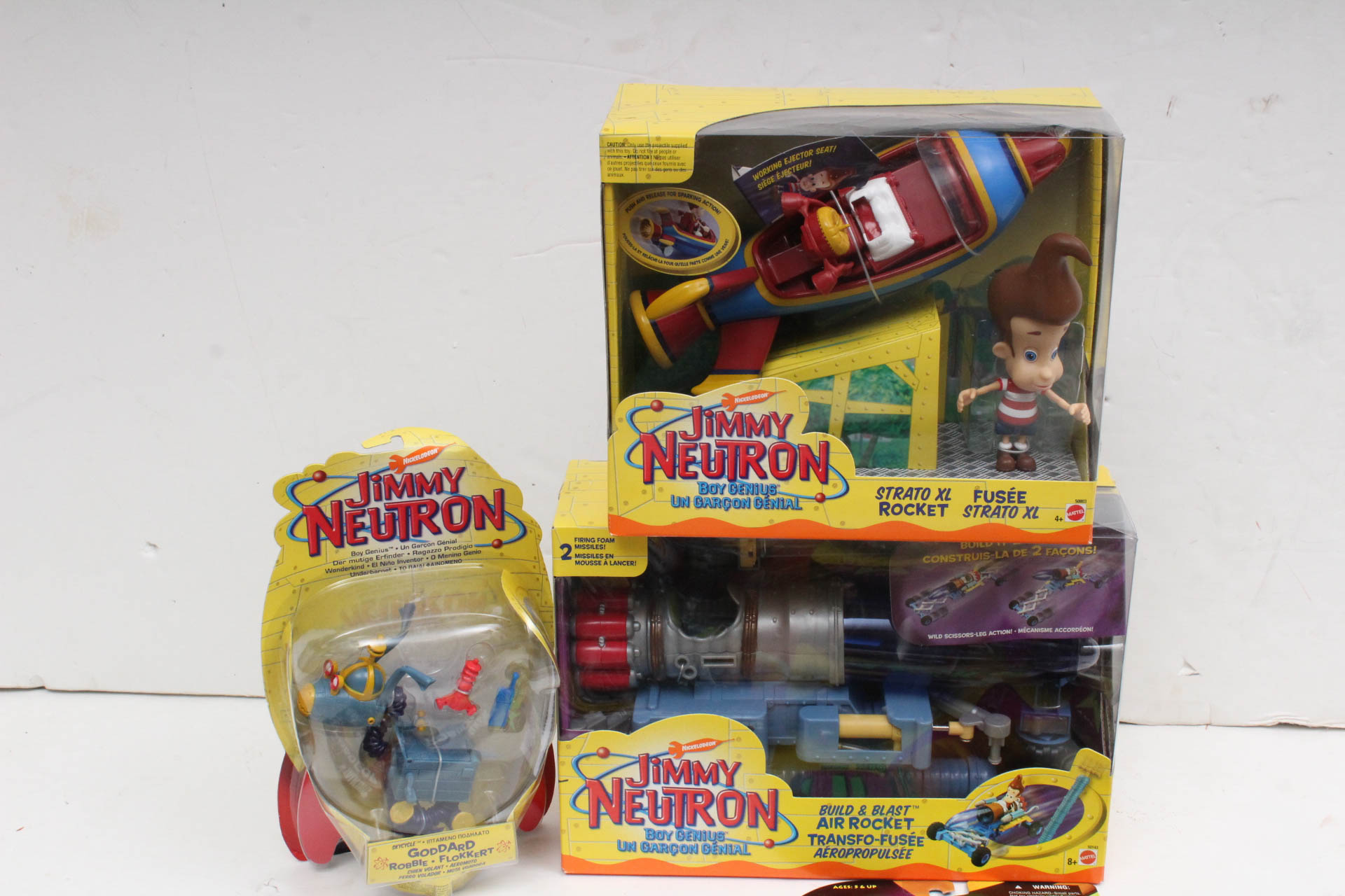 Action Figures Including "Jimmy Nutrino", "The Mask" and "Cosmic Boy"