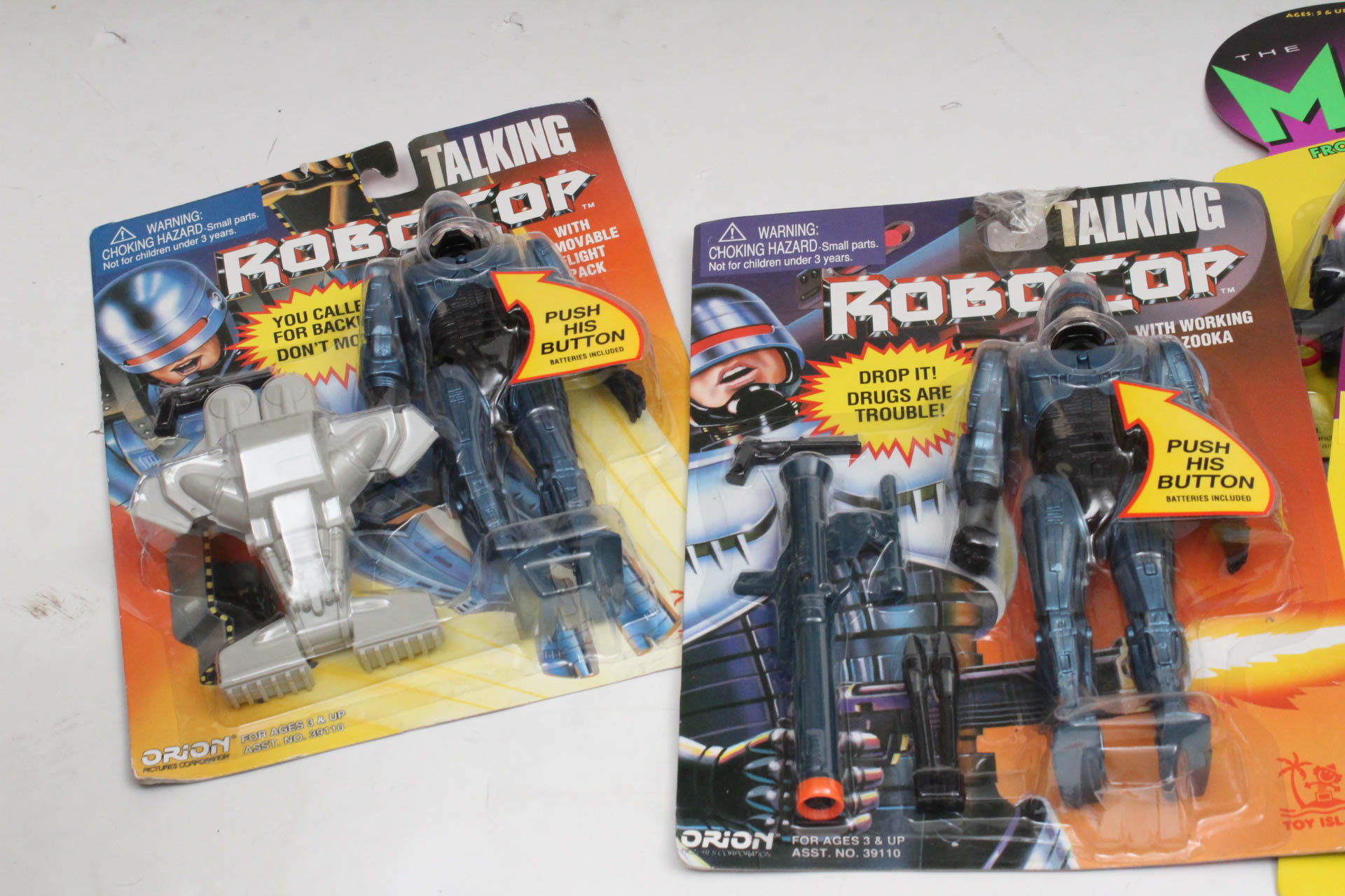 Action Figures Including "Jimmy Nutrino", "The Mask" and "Cosmic Boy"