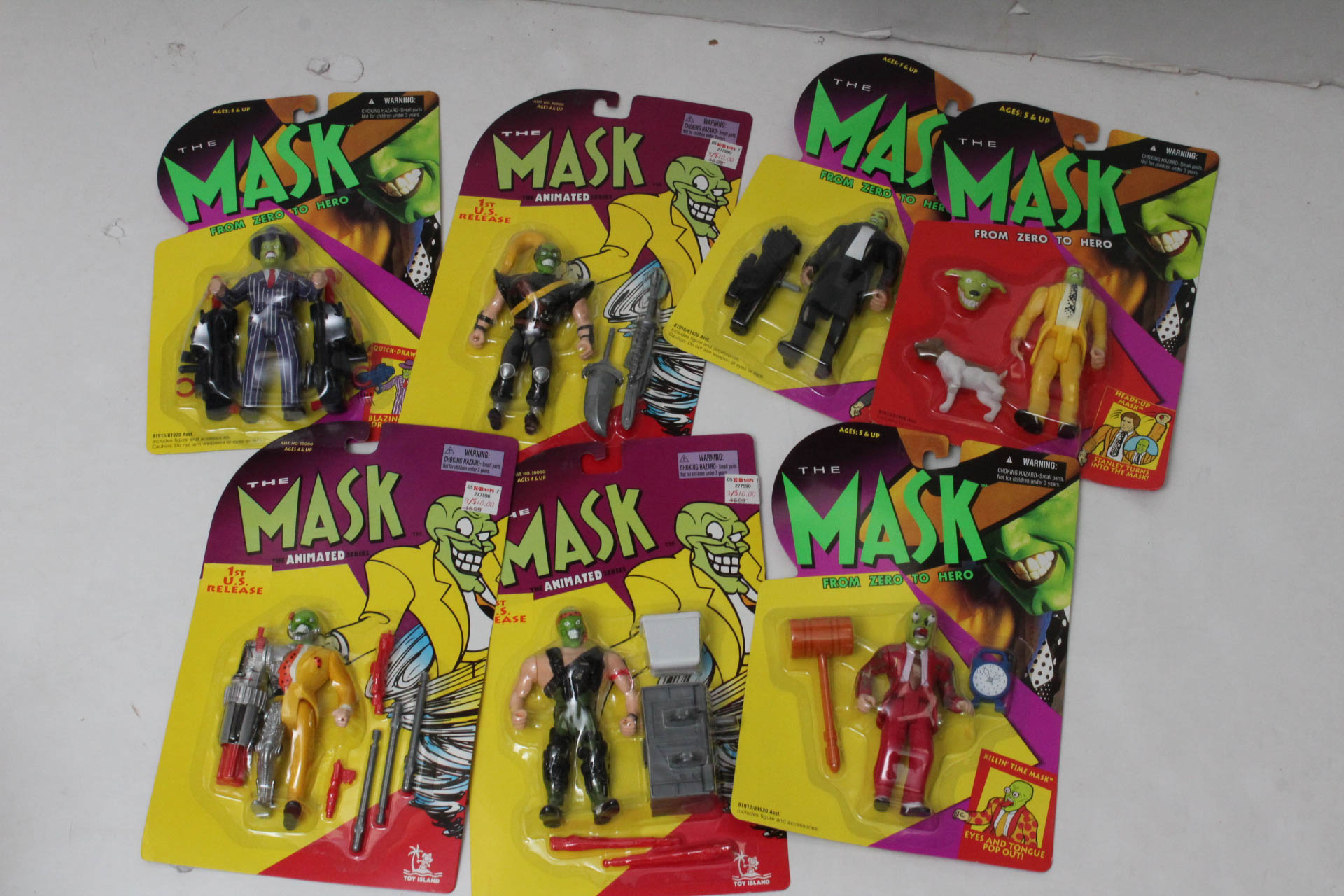 Action Figures Including "Jimmy Nutrino", "The Mask" and "Cosmic Boy"