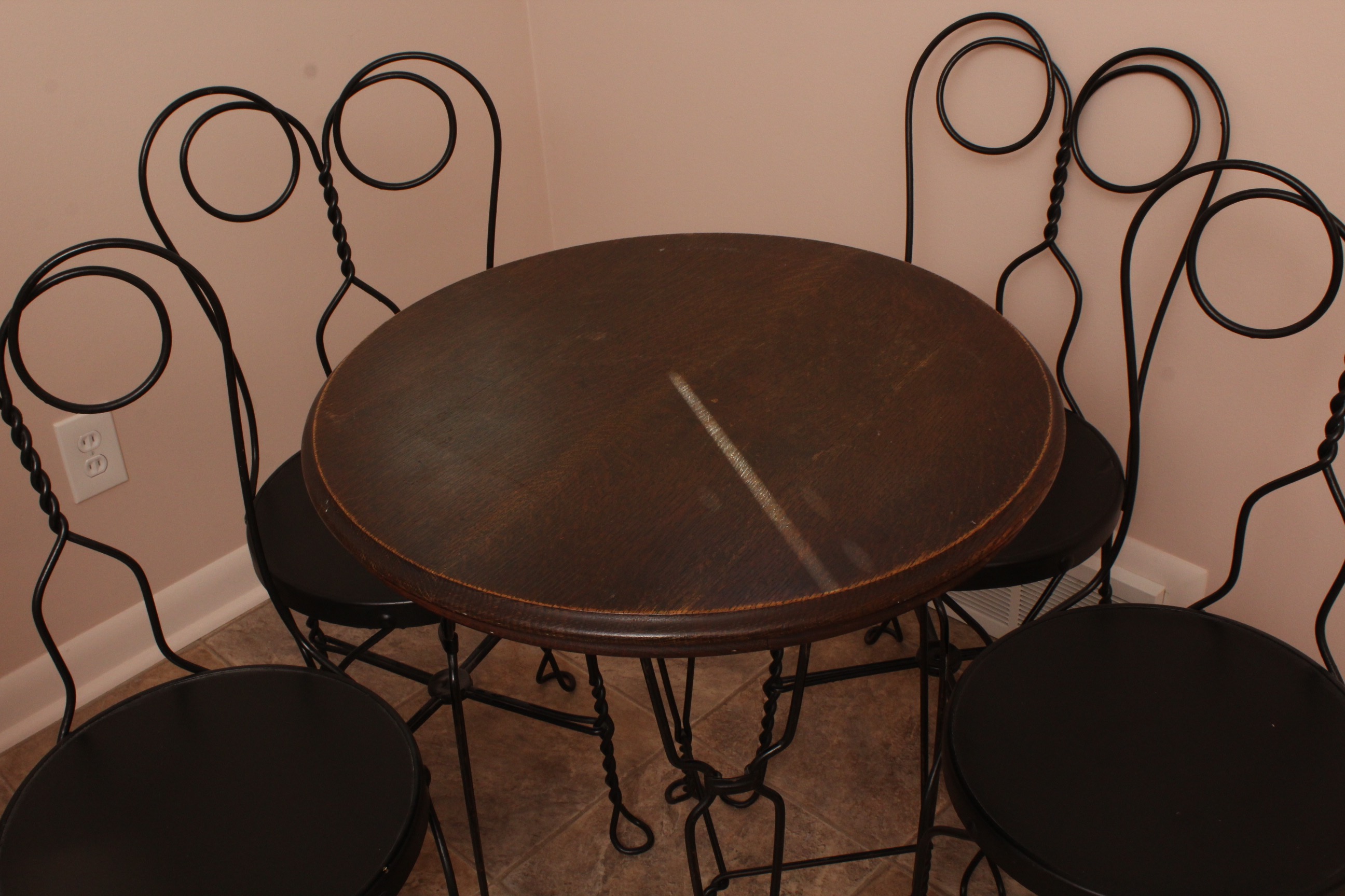 Vintage Wrought Iron Bistro Table with Four Chairs
