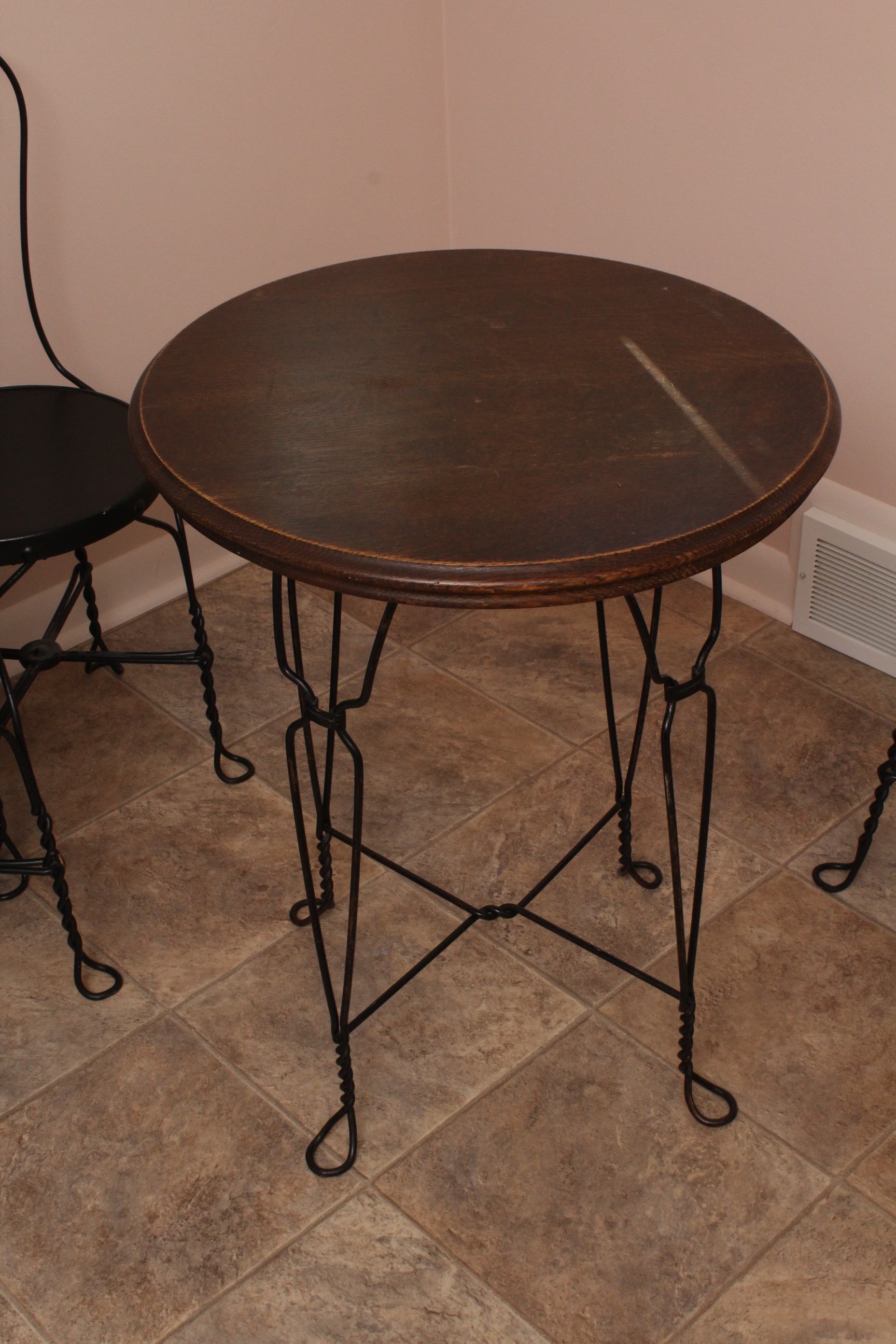 Vintage Wrought Iron Bistro Table with Four Chairs
